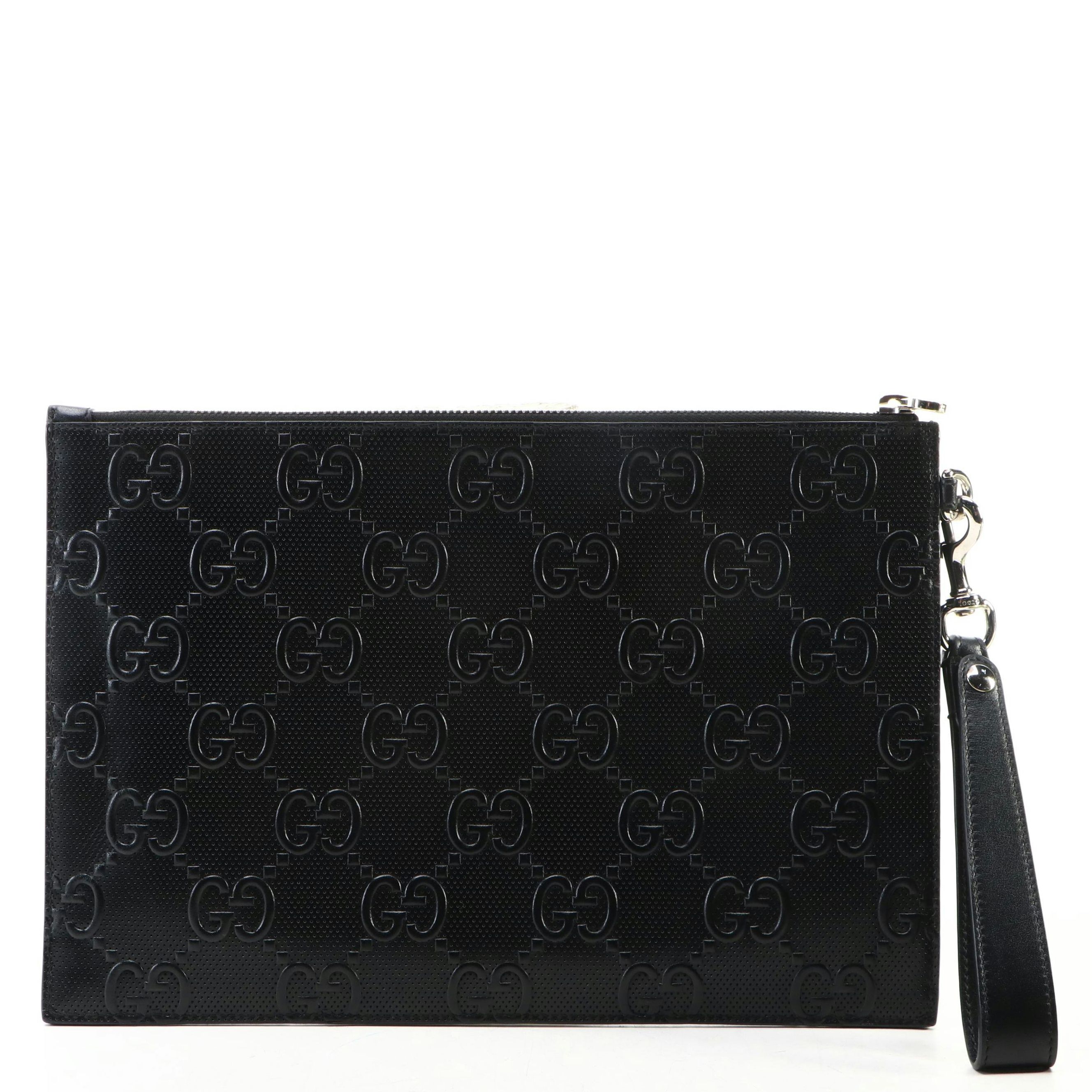 Gucci Zip Wristlet Clutch in Black Perforated GG Embossed Leather