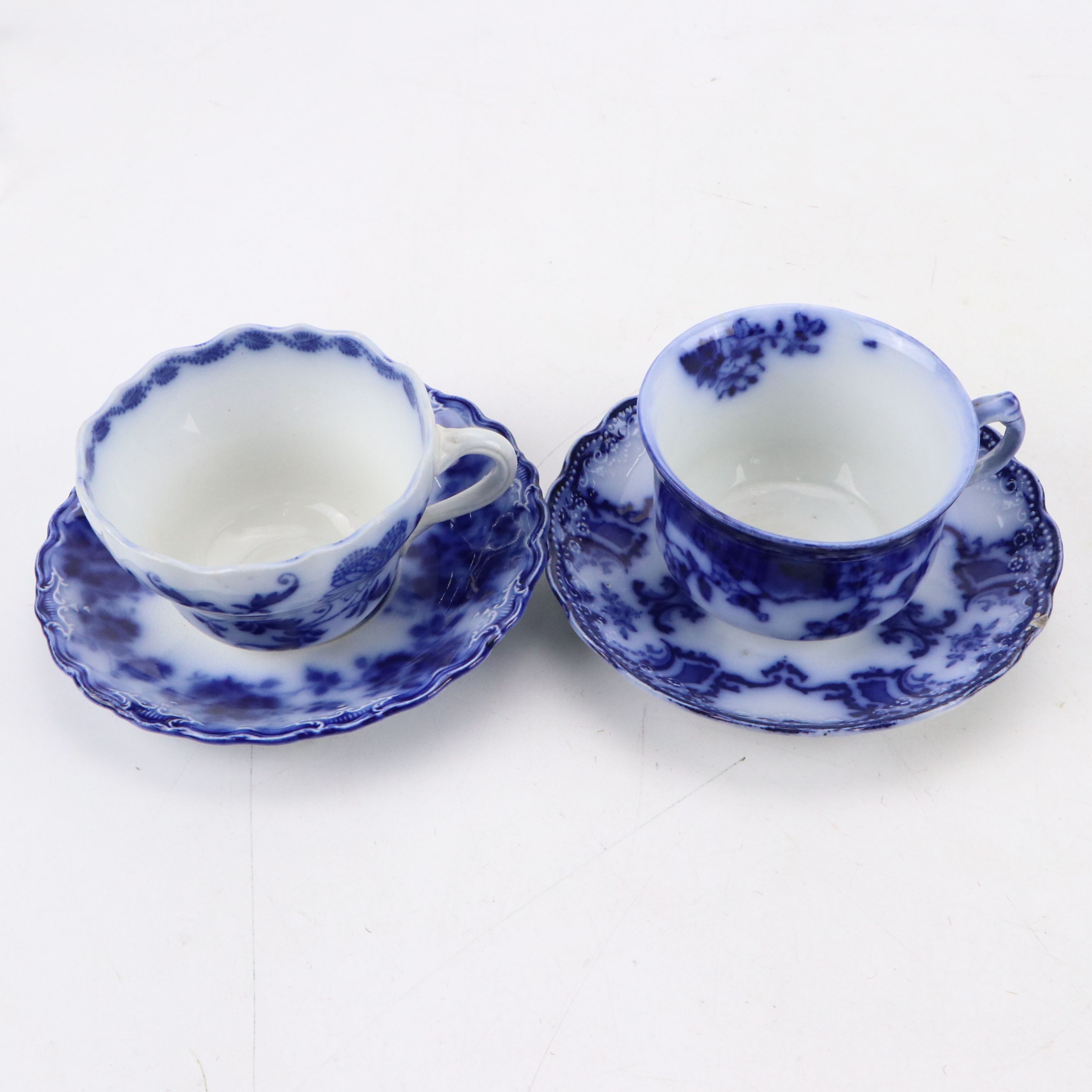 Flow Blue Iron Stone Ceramic Plates, Bowls, Teacups and Saucers with Stands