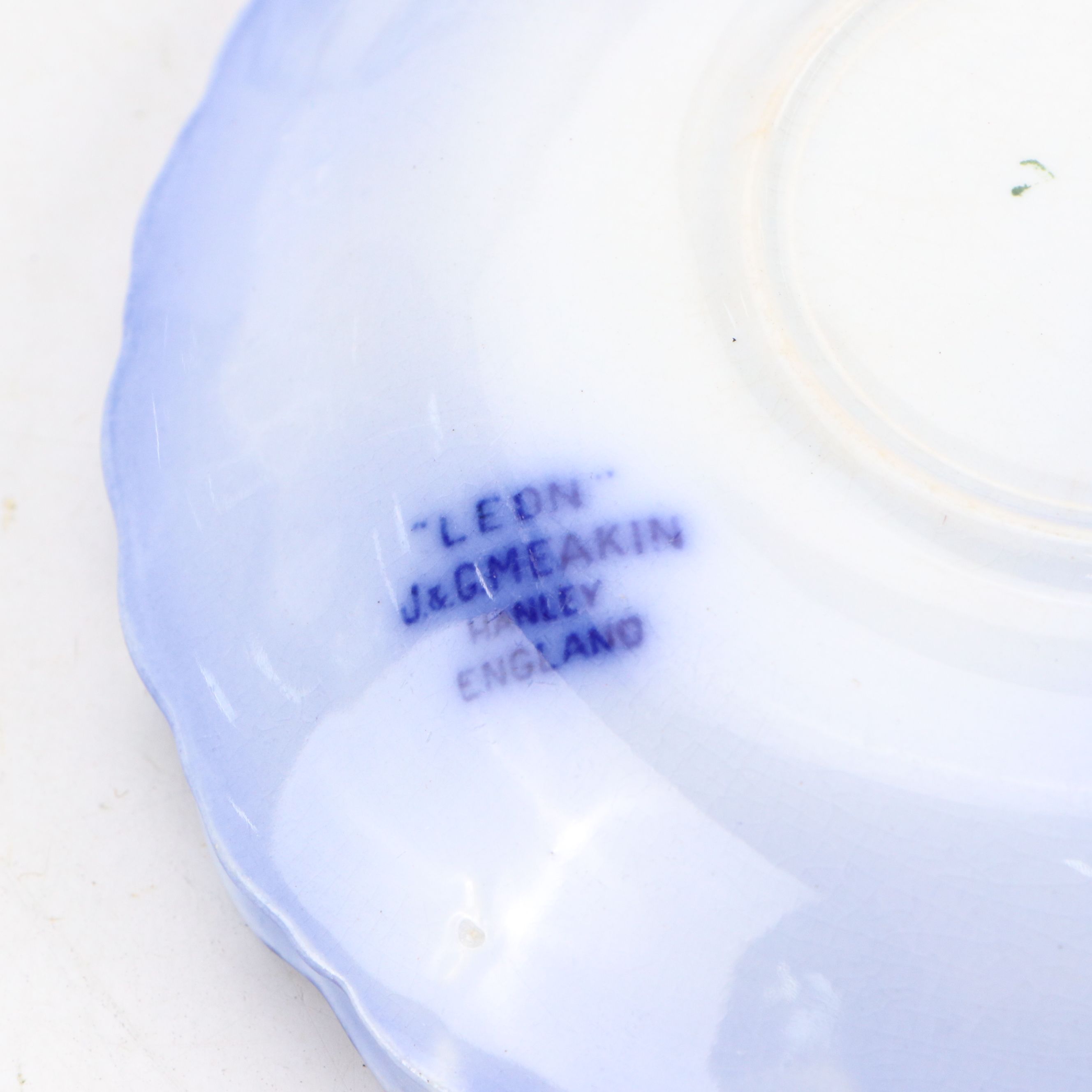 Flow Blue Iron Stone Ceramic Plates, Bowls, Teacups and Saucers with Stands