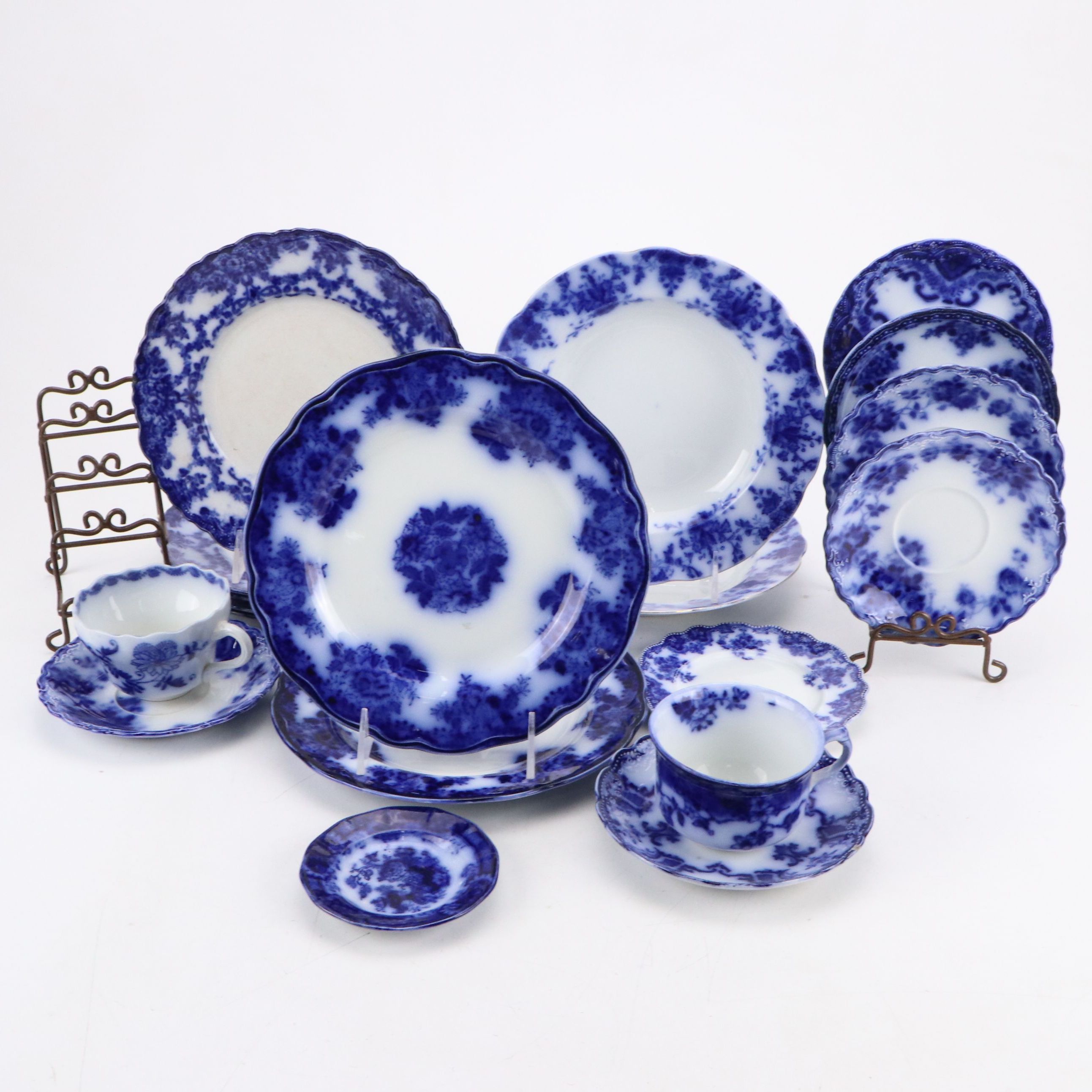 Flow Blue Iron Stone Ceramic Plates, Bowls, Teacups and Saucers with Stands