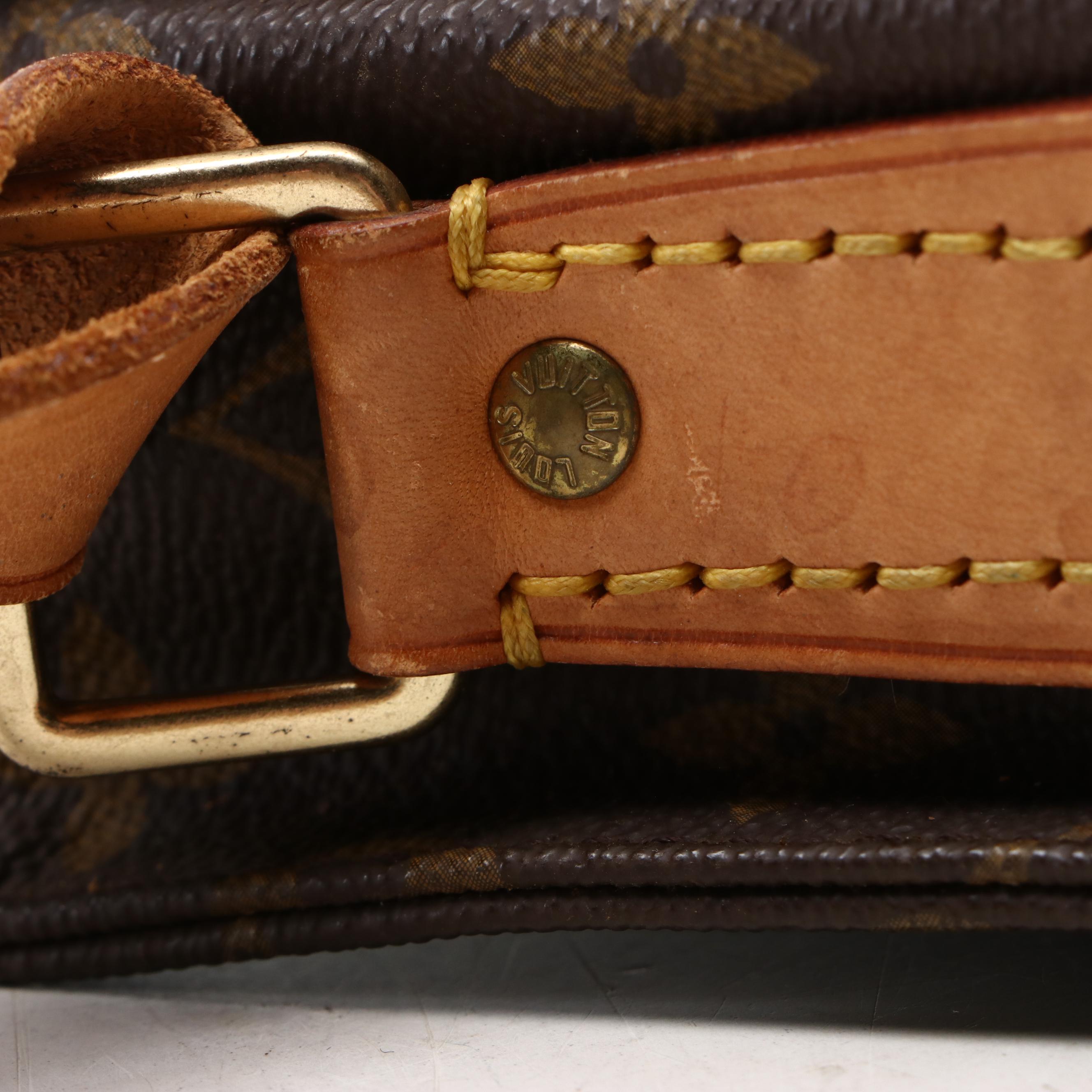 Louis Vuitton Cartouchière GM in Monogram Canvas and Vachetta Leather