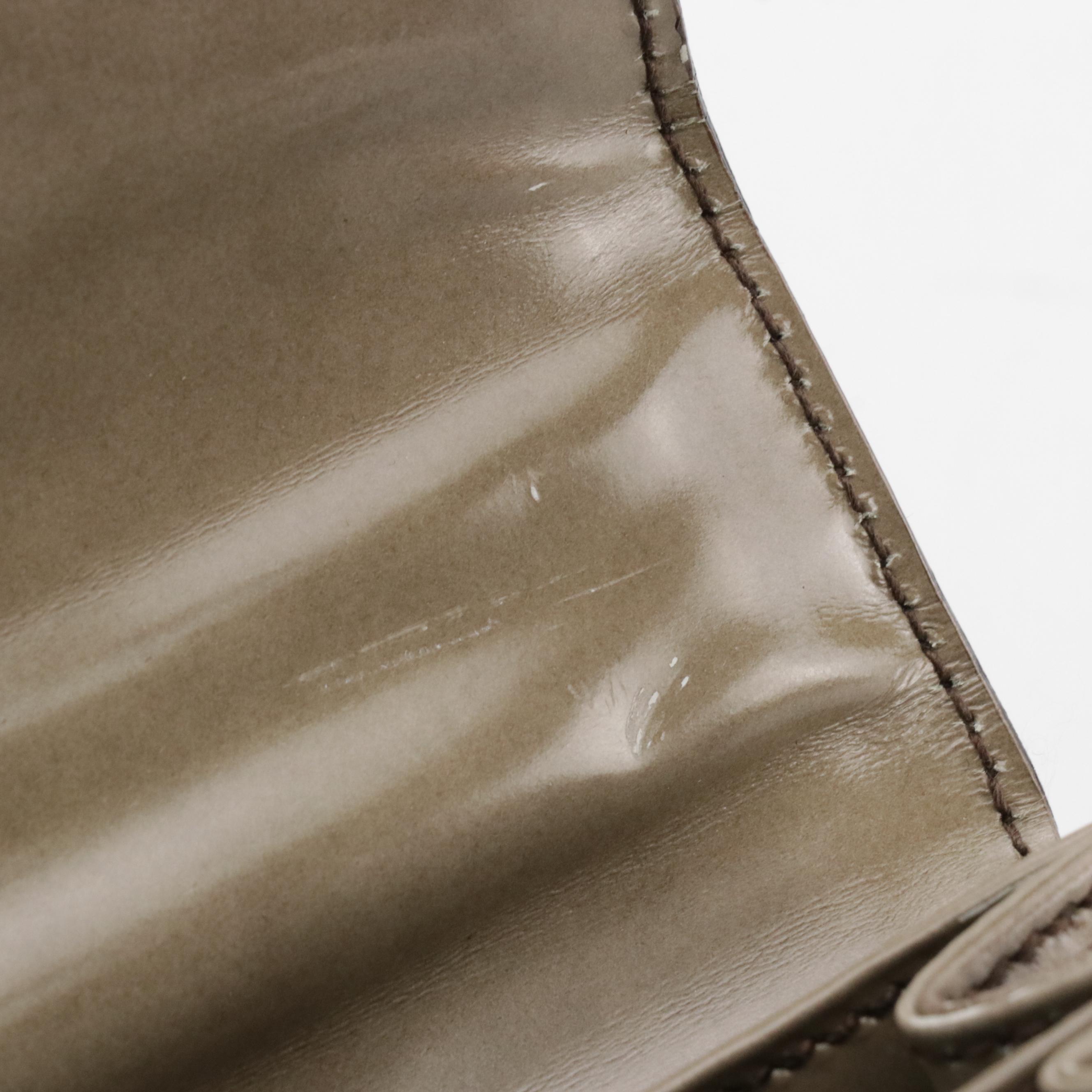 Prada Buckle Strap Handbag in Cloudy Taupe Patent Leather