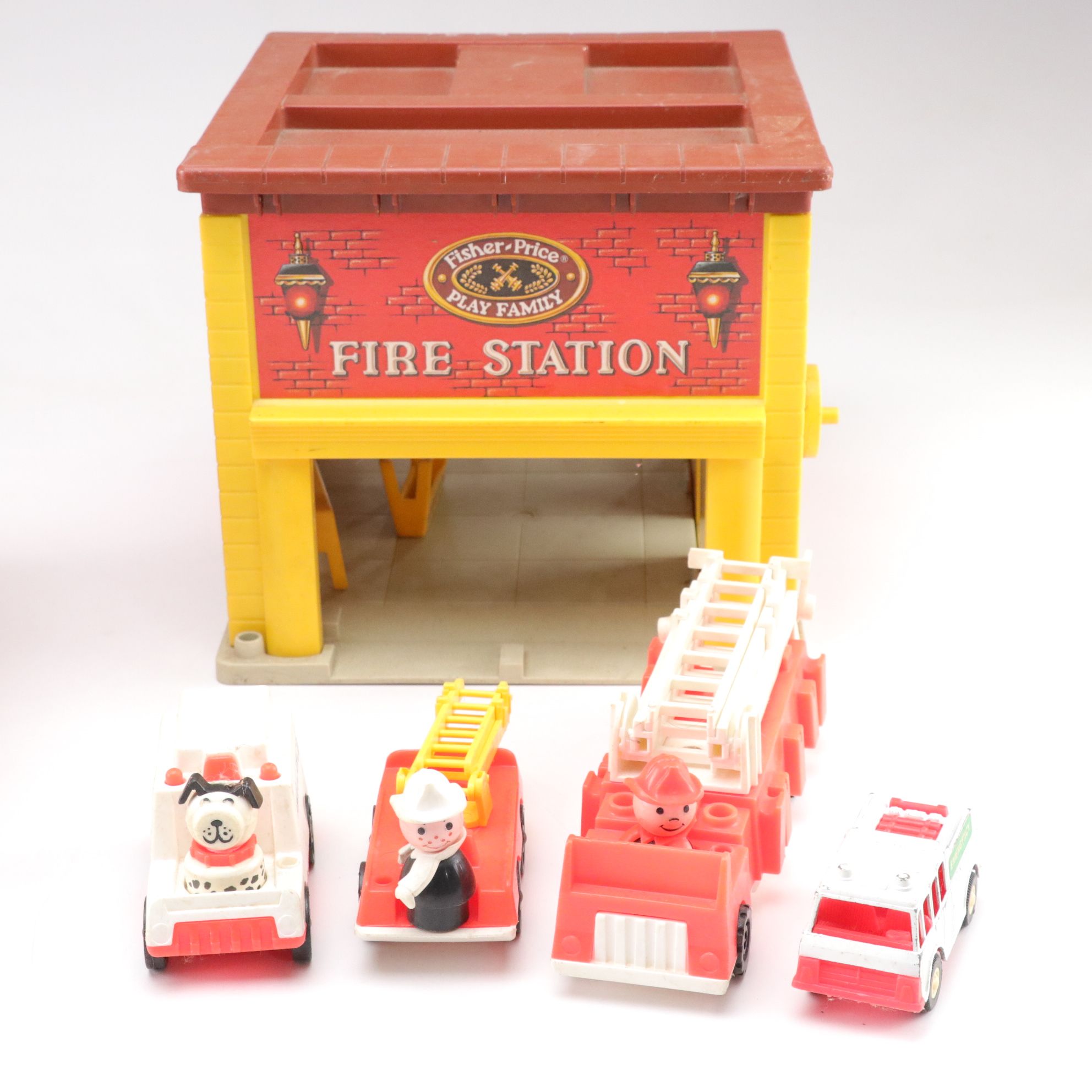Fisher-Price Chatter Telephone with Farmhouse & Fire Station Play Sets