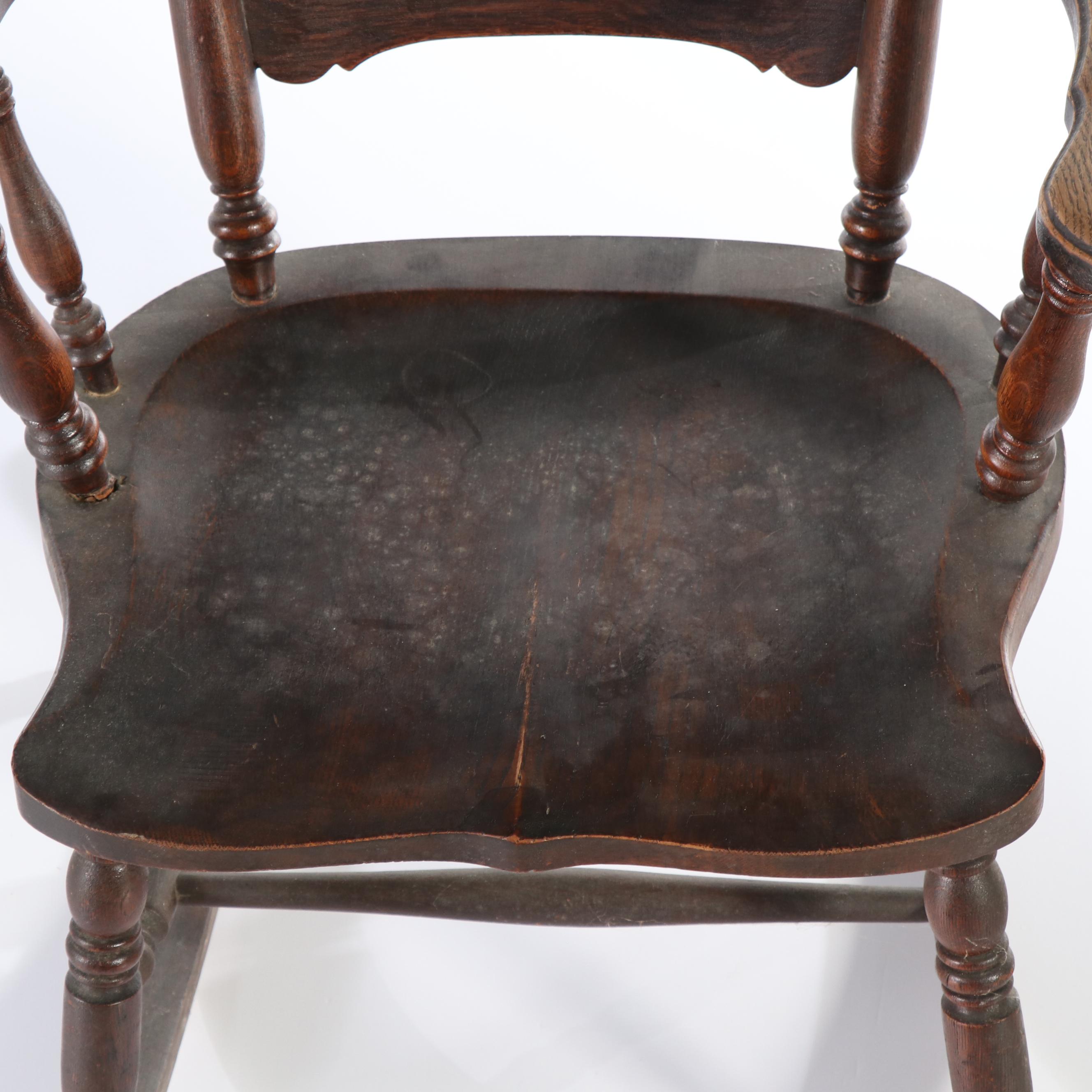 Colonial Revival Pressed Back Oak Rocking Chair, Early 20th Century