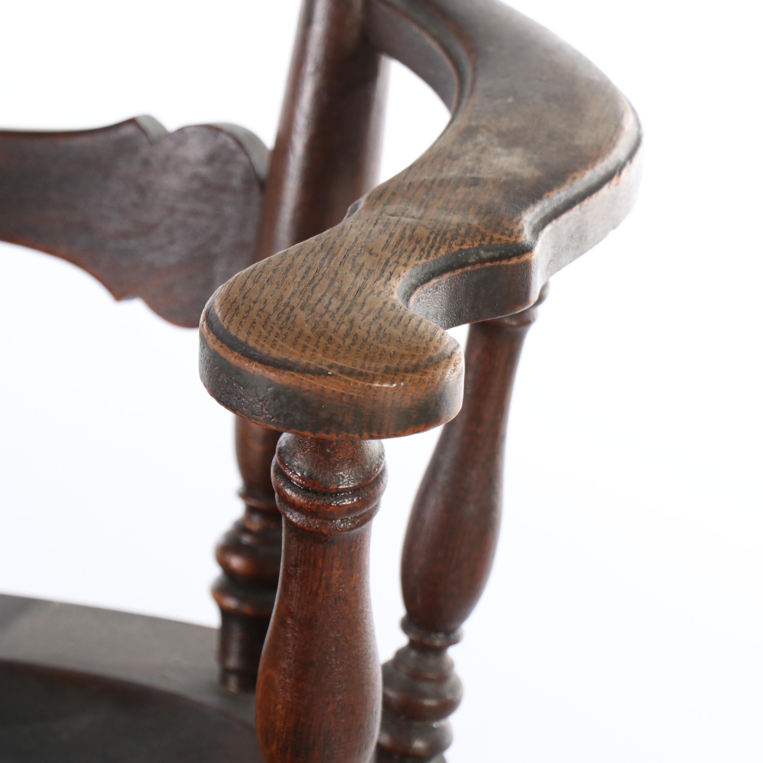 Colonial Revival Pressed Back Oak Rocking Chair, Early 20th Century