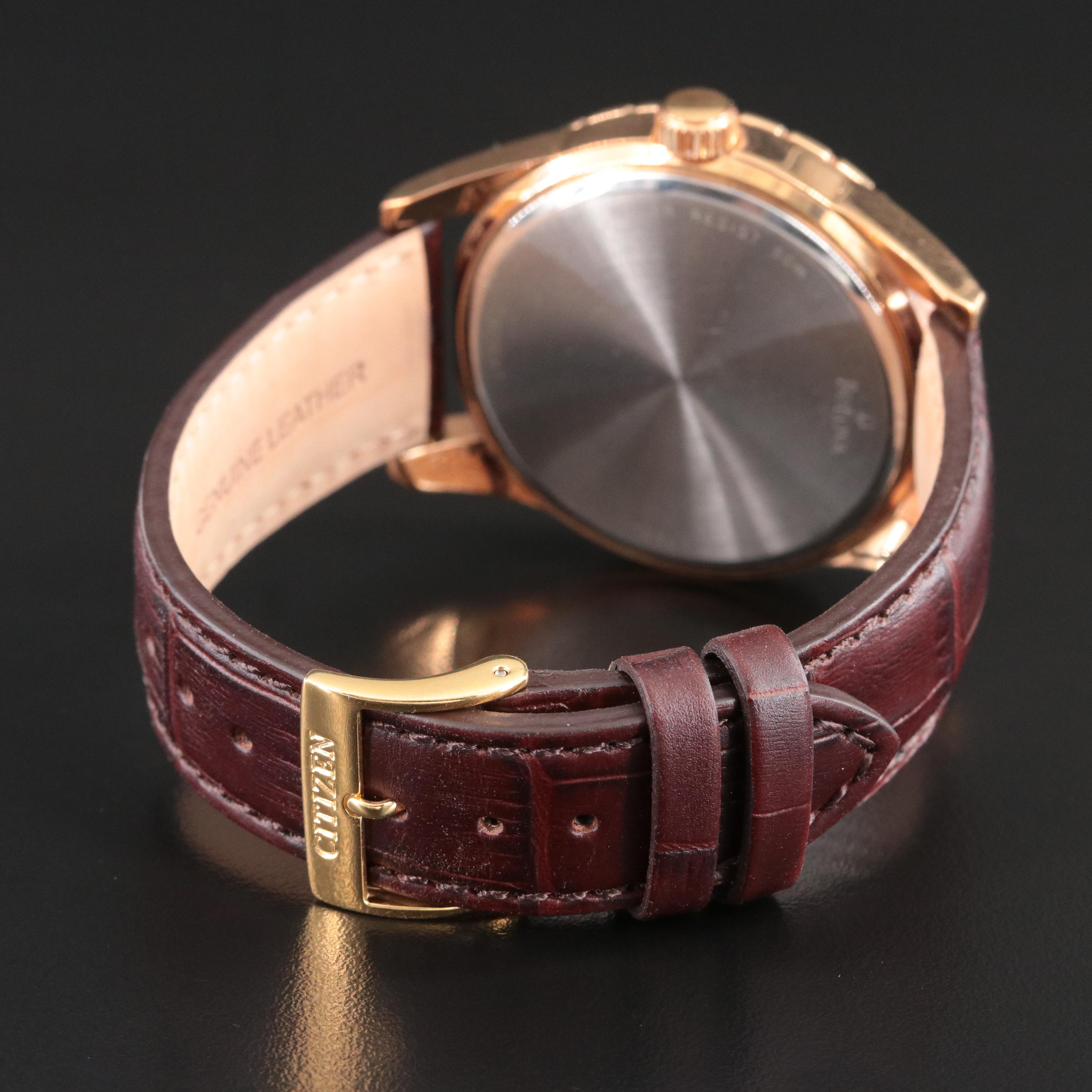 Caravelle by Bulova Day, Date, 24 hour Sub Dials Gold Tone Watch