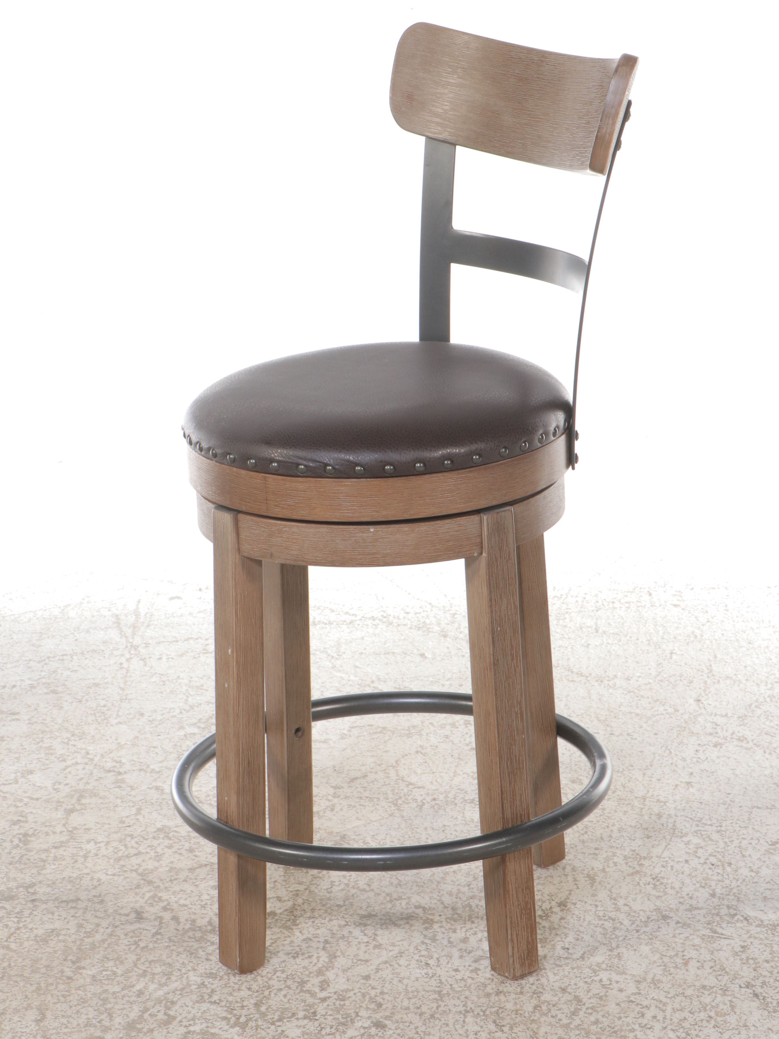 Pair of Ashley Furniture Contemporary Faux Leather and Wood Barstools