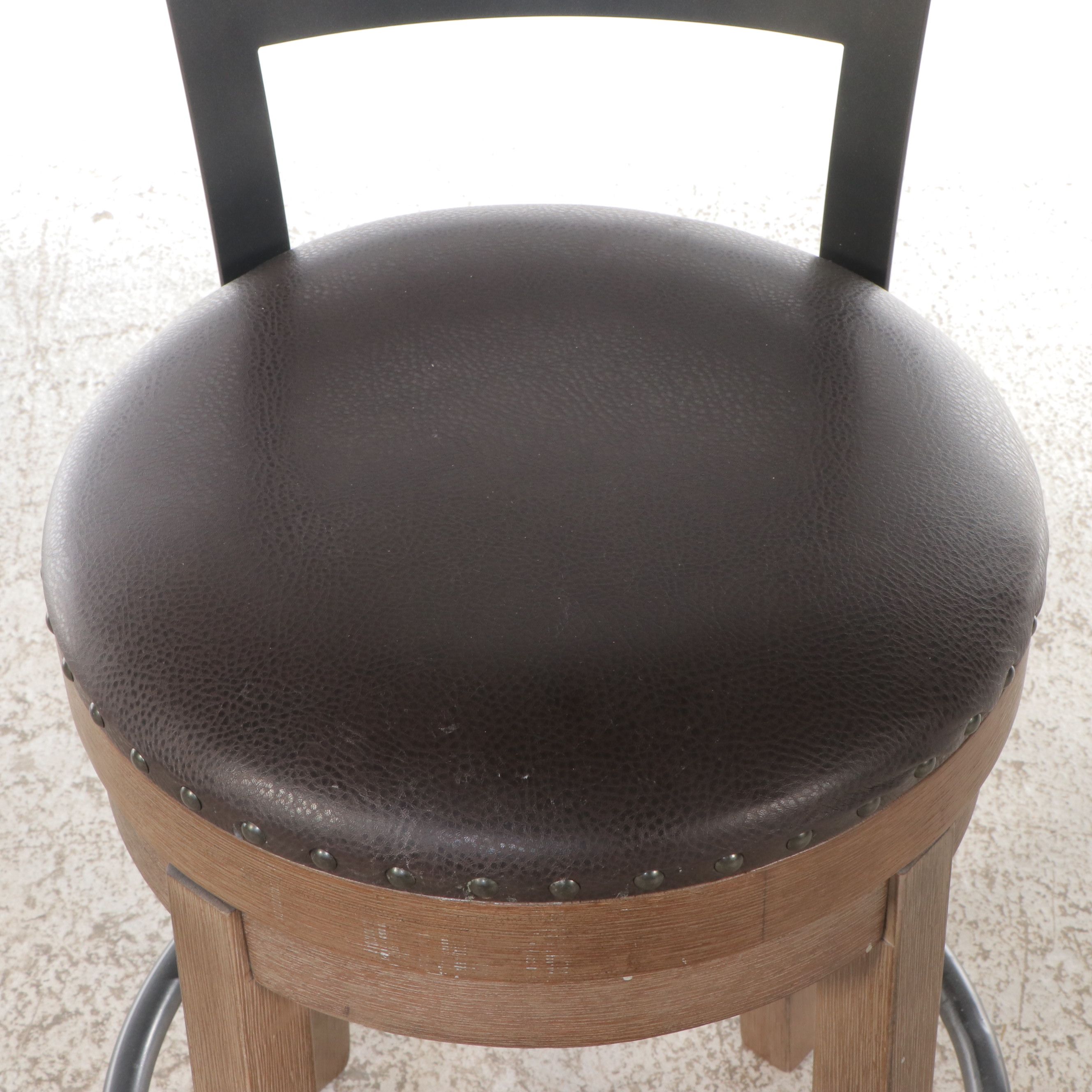 Pair of Ashley Furniture Contemporary Faux Leather and Wood Barstools