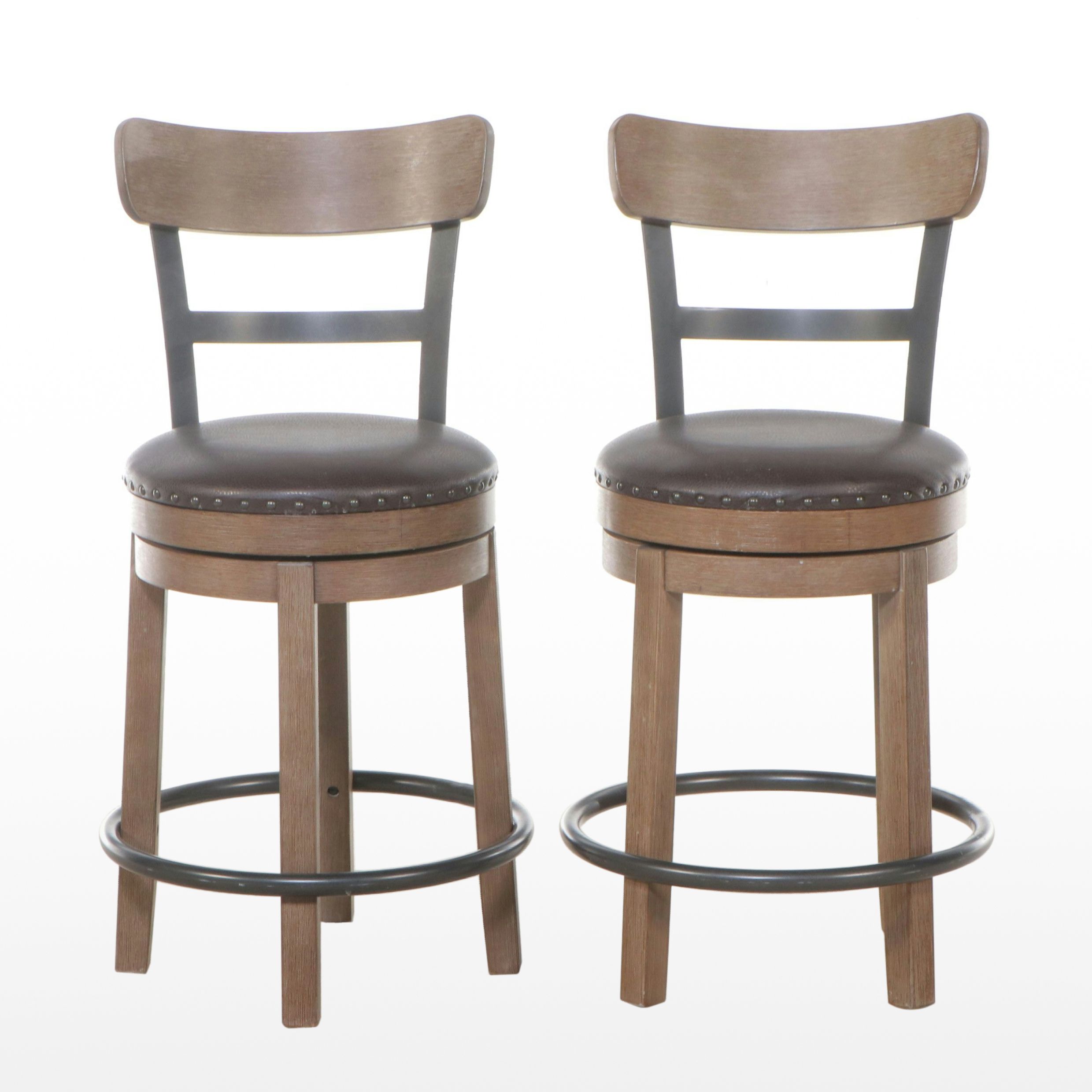 Pair of Ashley Furniture Contemporary Faux Leather and Wood Barstools