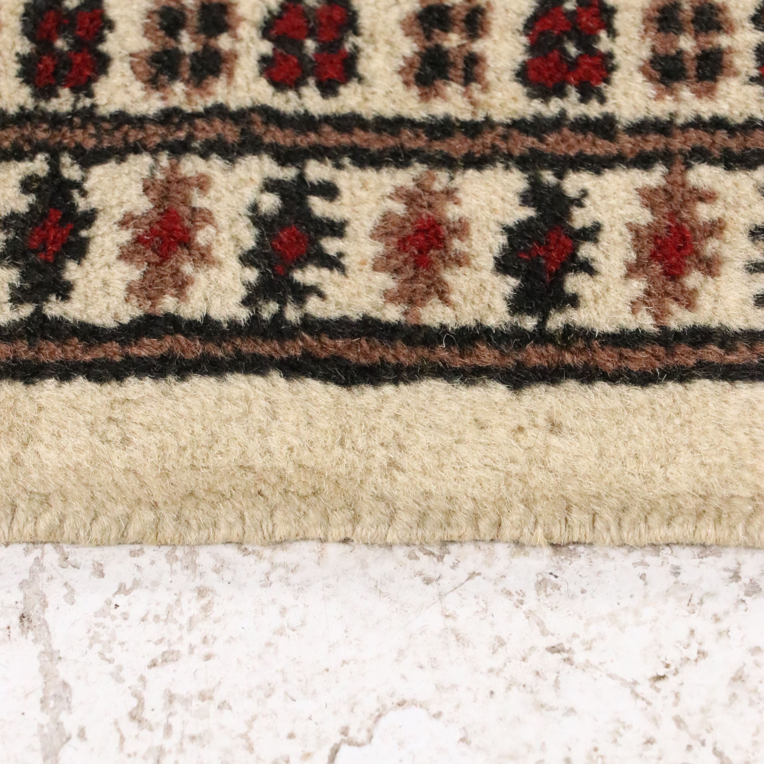 6'2 x 9' Hand-Knotted Pakistani Bokhara Area Rug