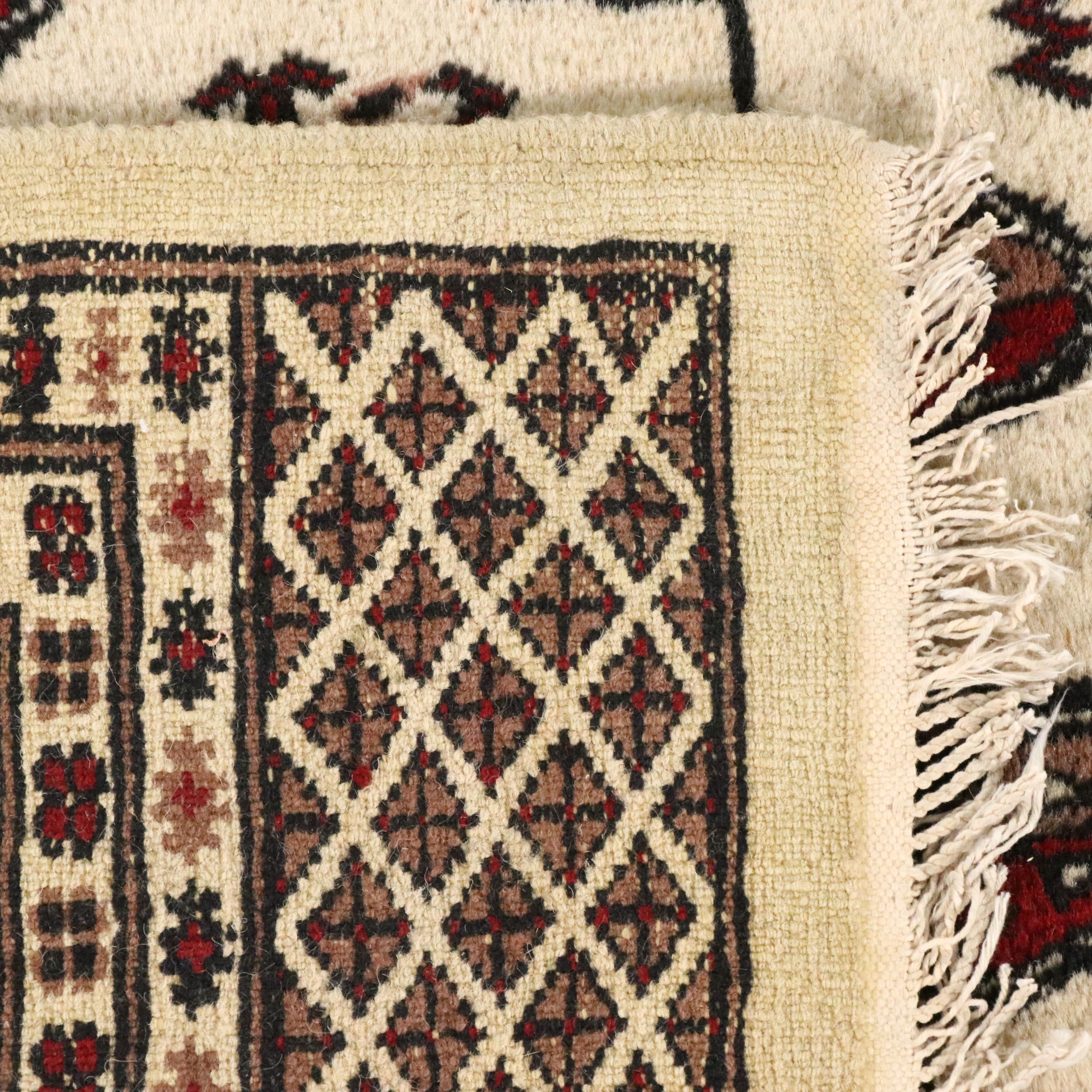 6'2 x 9' Hand-Knotted Pakistani Bokhara Area Rug