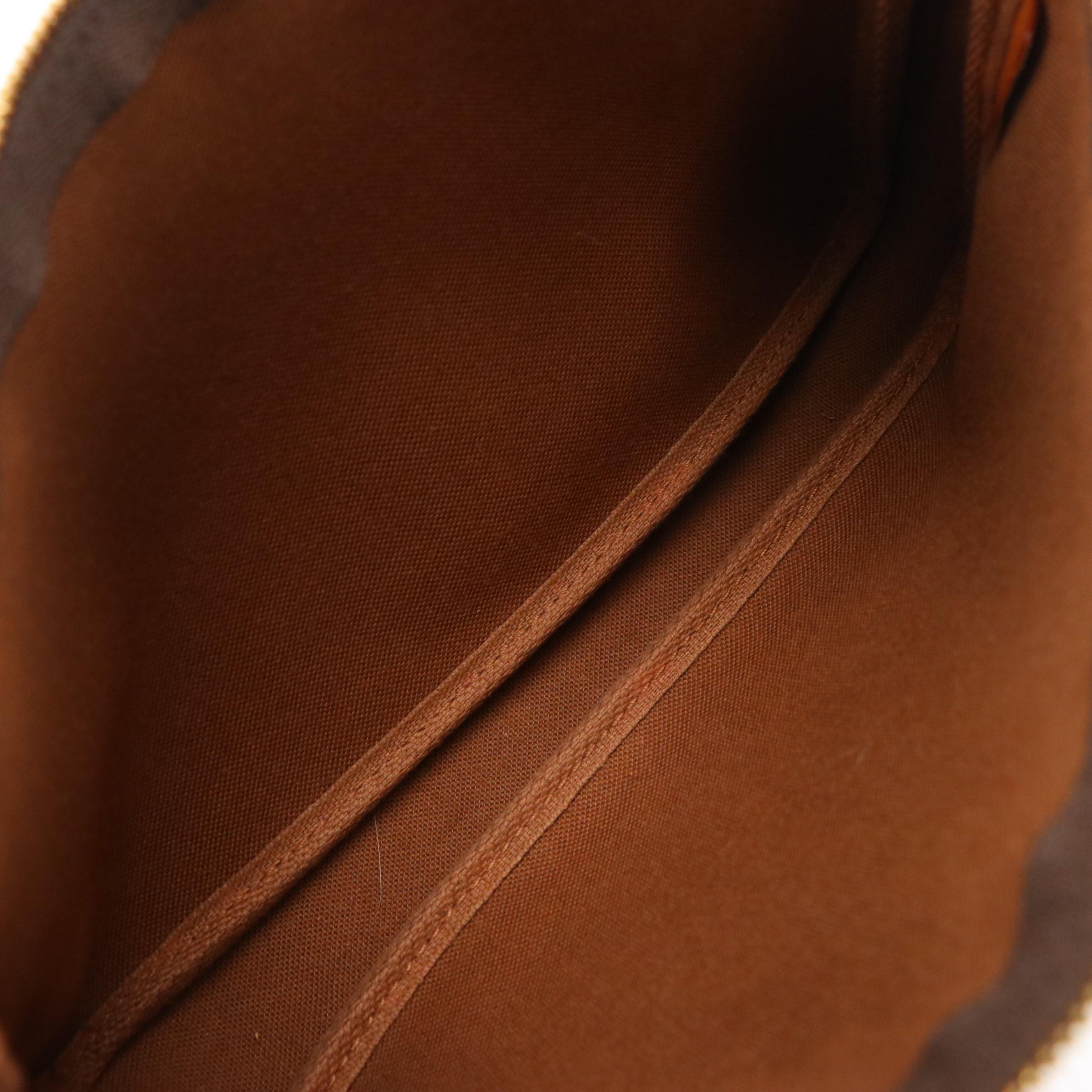 Louis Vuitton Zip Pochette in Monogram Canvas and Leather