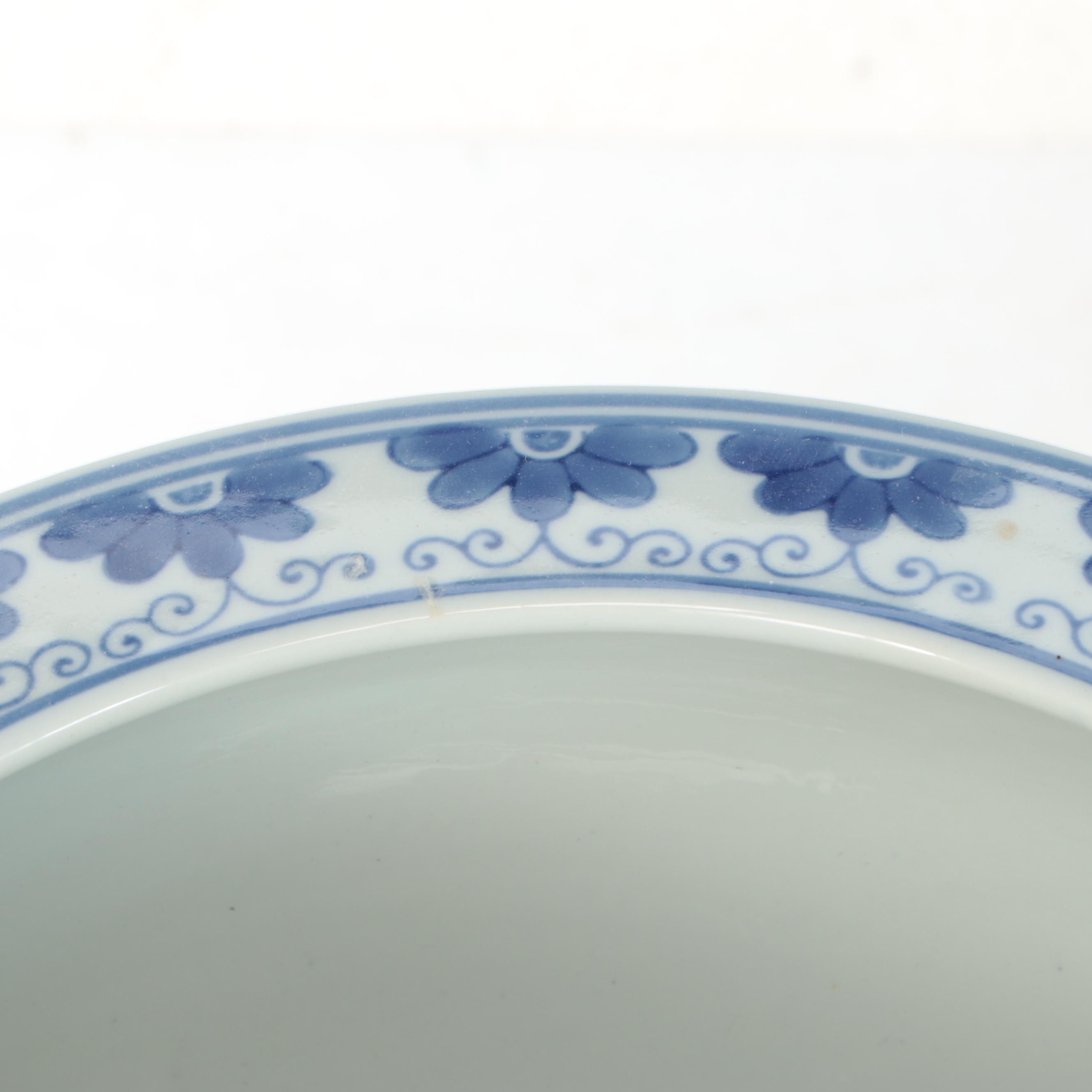 Pair of Chinese Blue and White Ceramic Planters with Wooden Stands