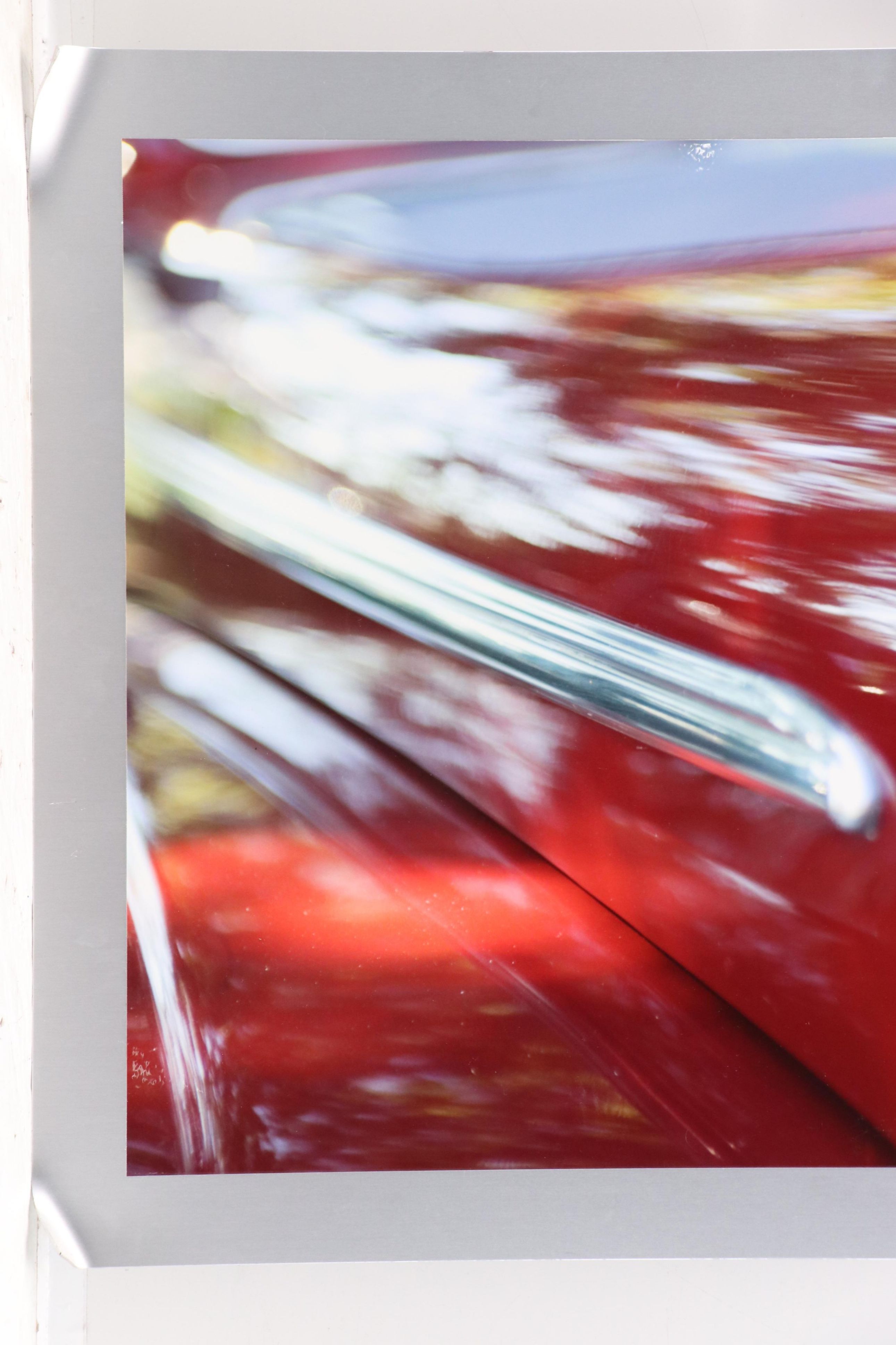 Contemporary Photographs of Roulette Wheel and Moving Car, Mounted to Metal
