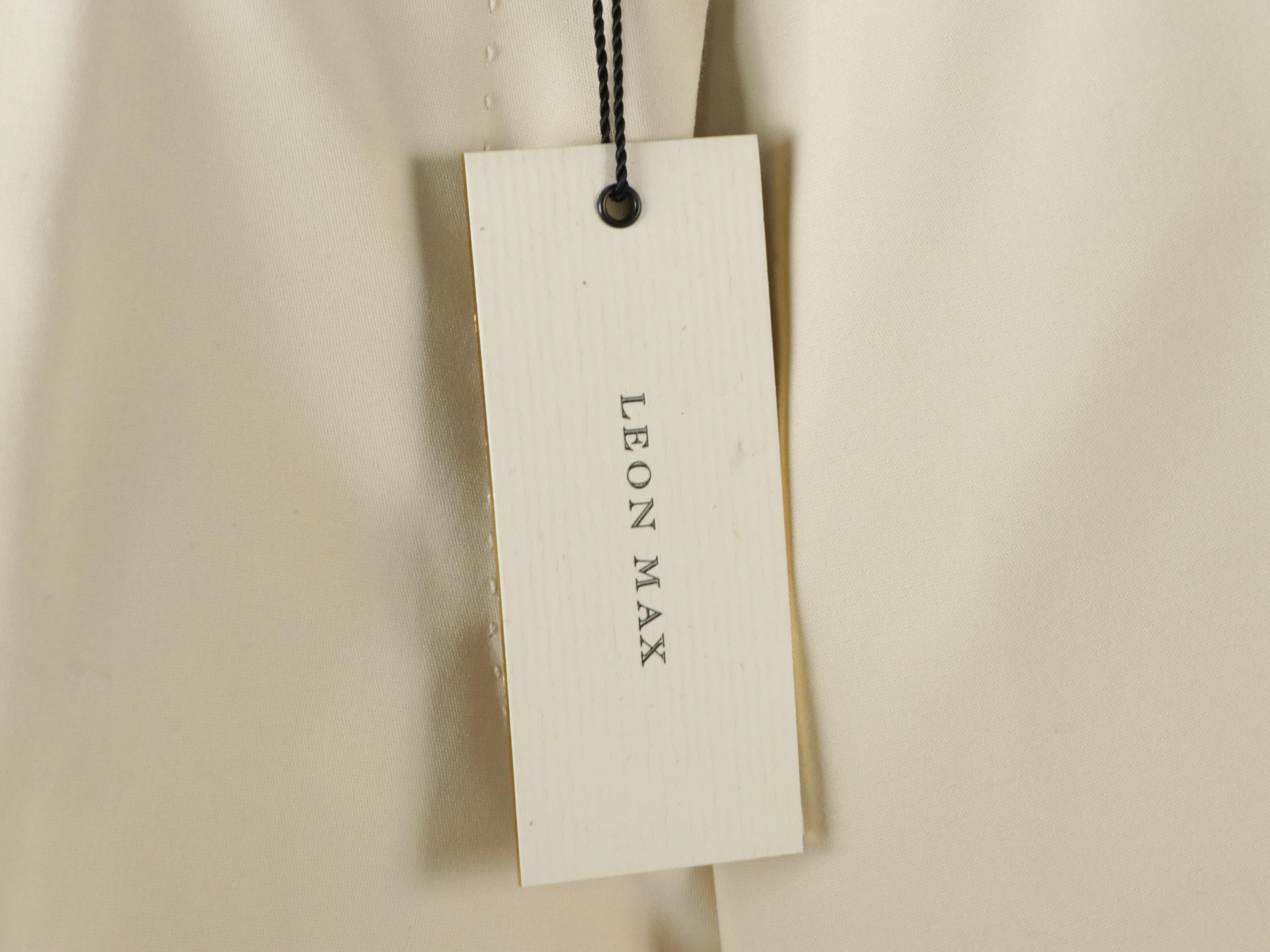 Leon Max Pleated Silk Blouses, Stretch Cotton Dress Pants, and Other Knit Tops