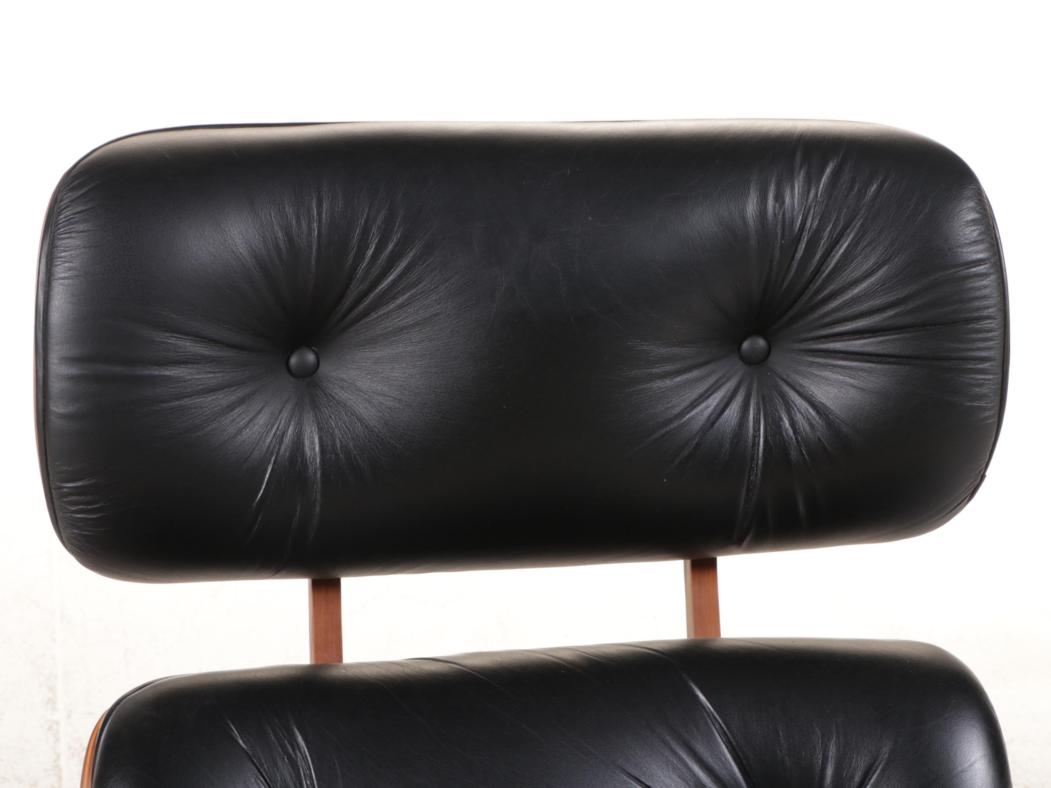 Selig Molded Walnut and Black Leather Lounge Chair and Ottoman