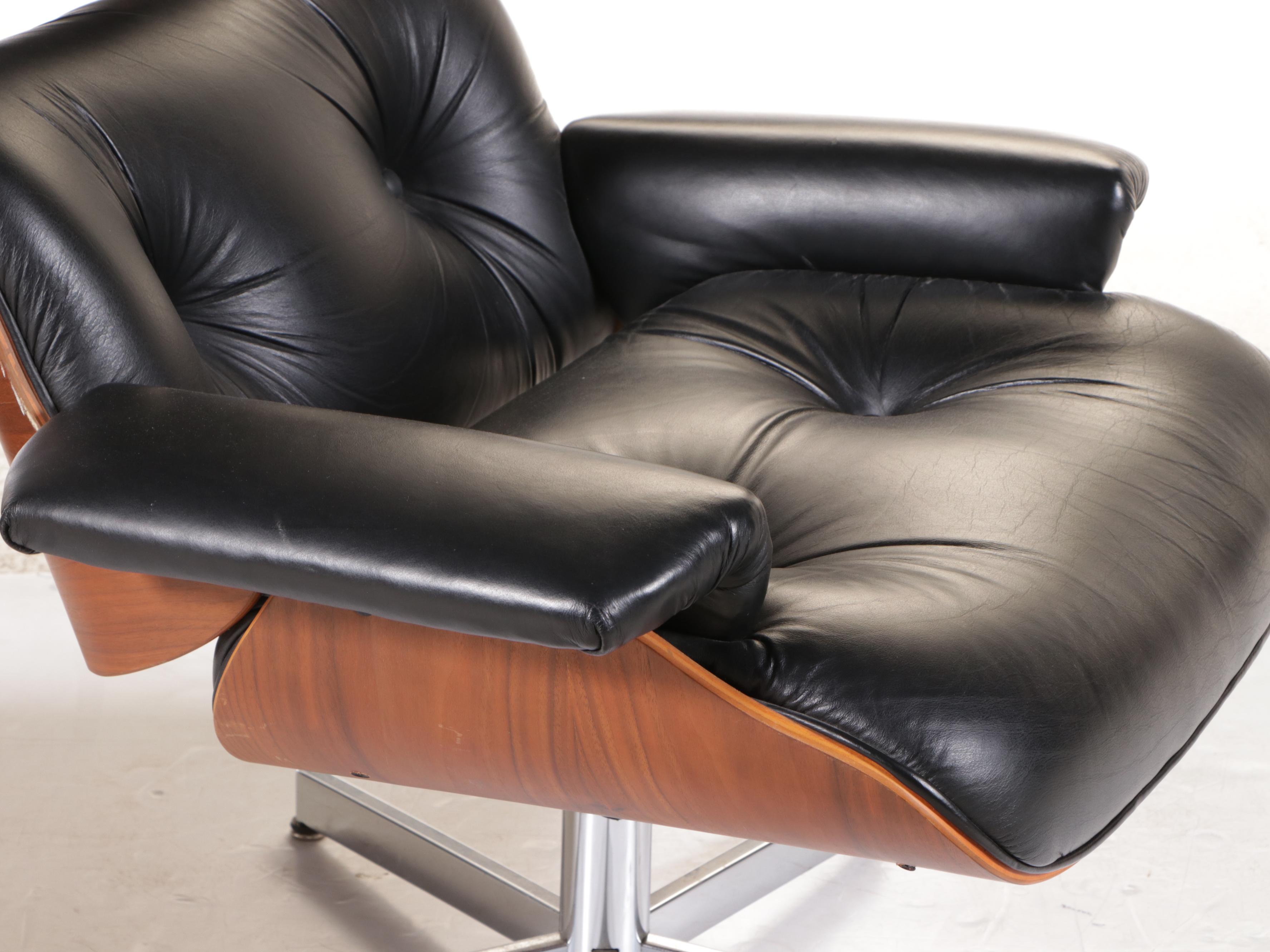 Selig Molded Walnut and Black Leather Lounge Chair and Ottoman