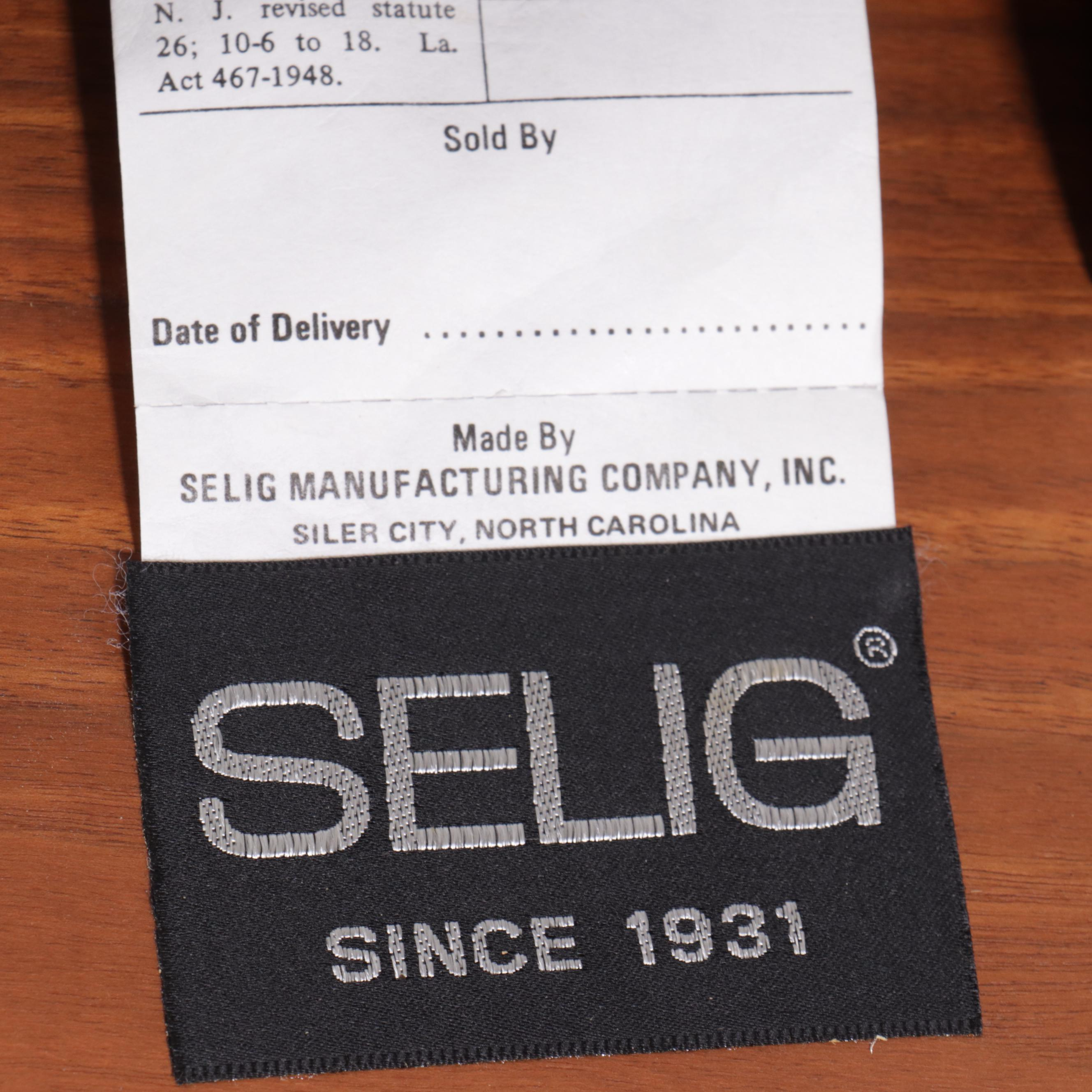 Selig Molded Walnut and Black Leather Lounge Chair and Ottoman