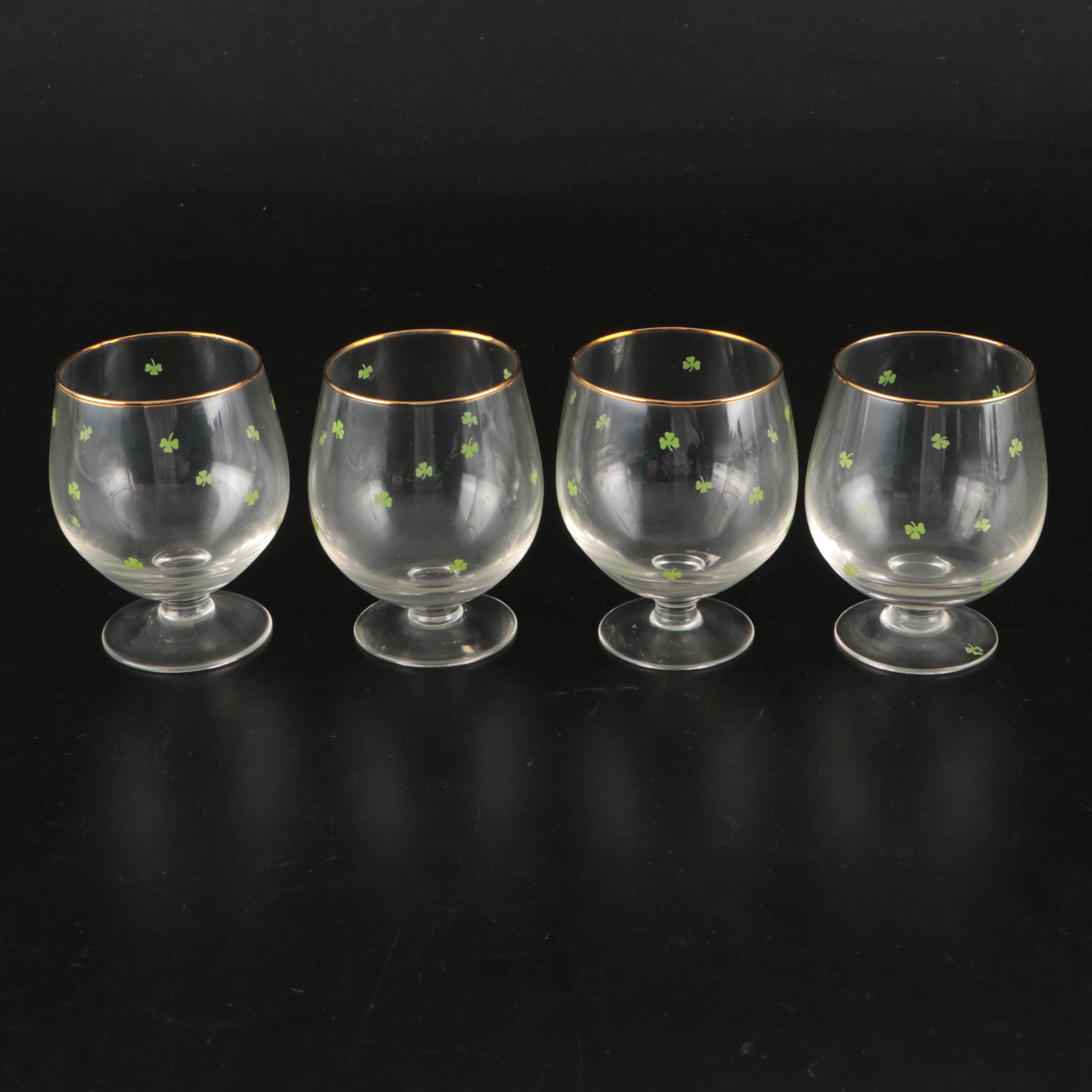 Belleek Ceramic Creamers and Sugar Bowls with Waterford Gilt Brandy Glasses