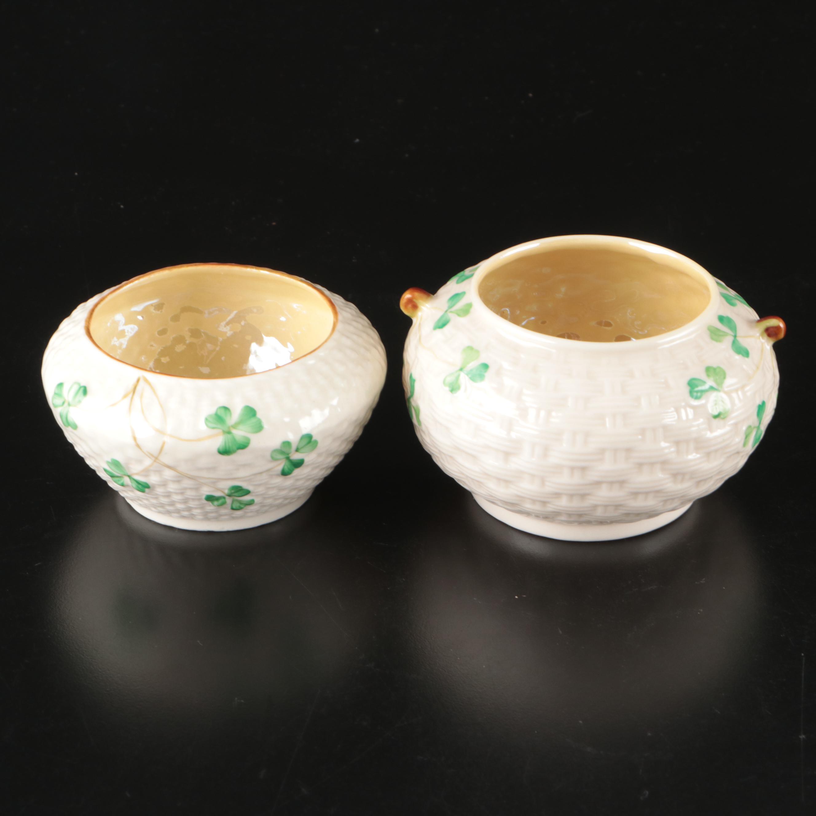 Belleek Ceramic Creamers and Sugar Bowls with Waterford Gilt Brandy Glasses