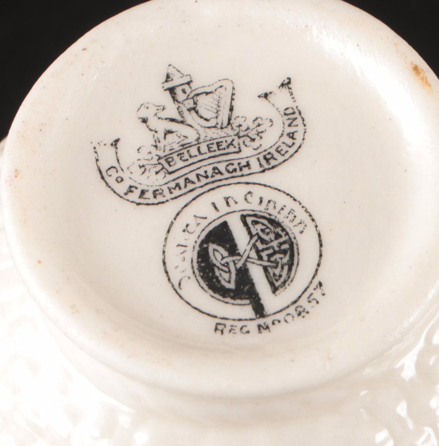 Belleek Ceramic Creamers and Sugar Bowls with Waterford Gilt Brandy Glasses