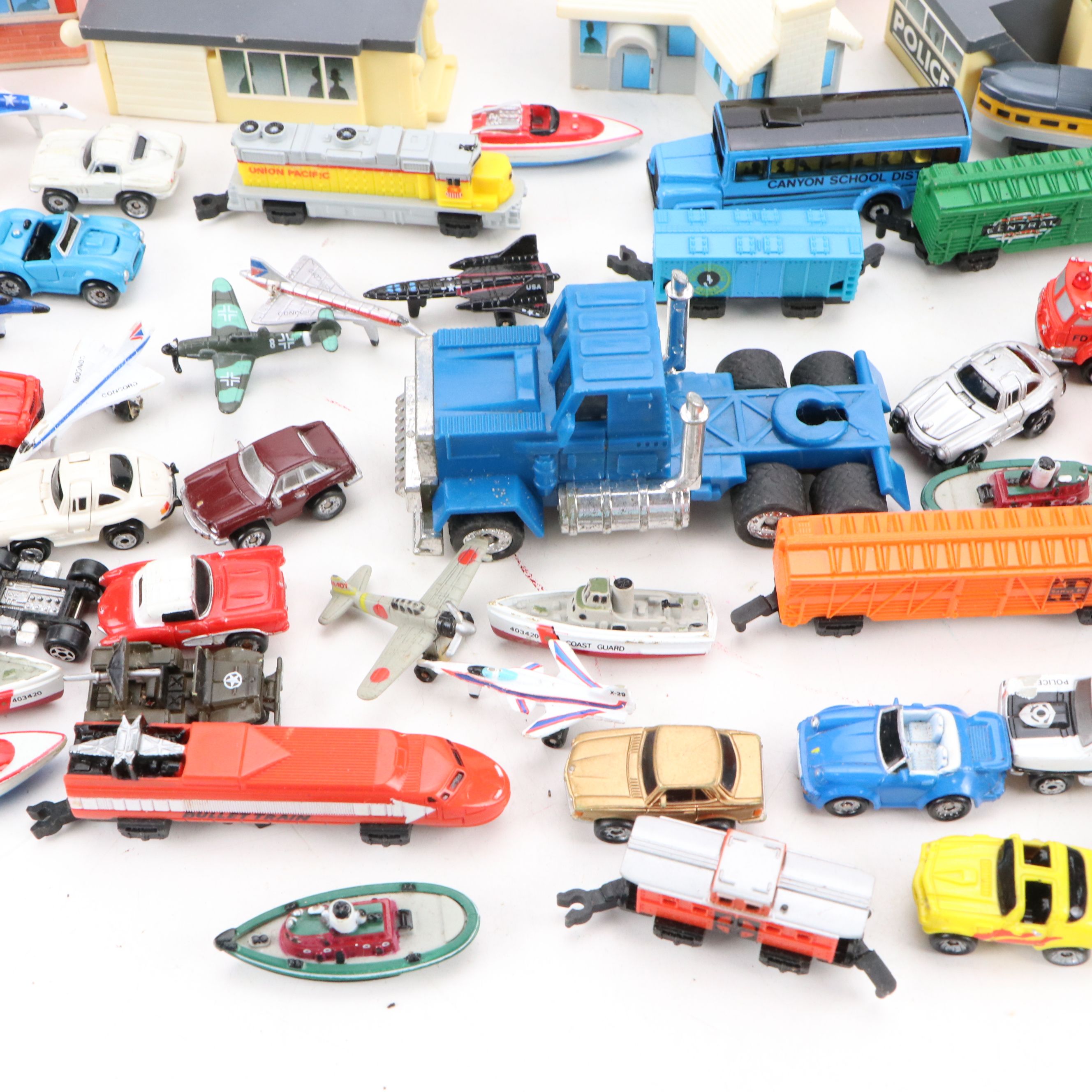 Micro Machines and More Diecast Cars and Vehicles with Play Sets