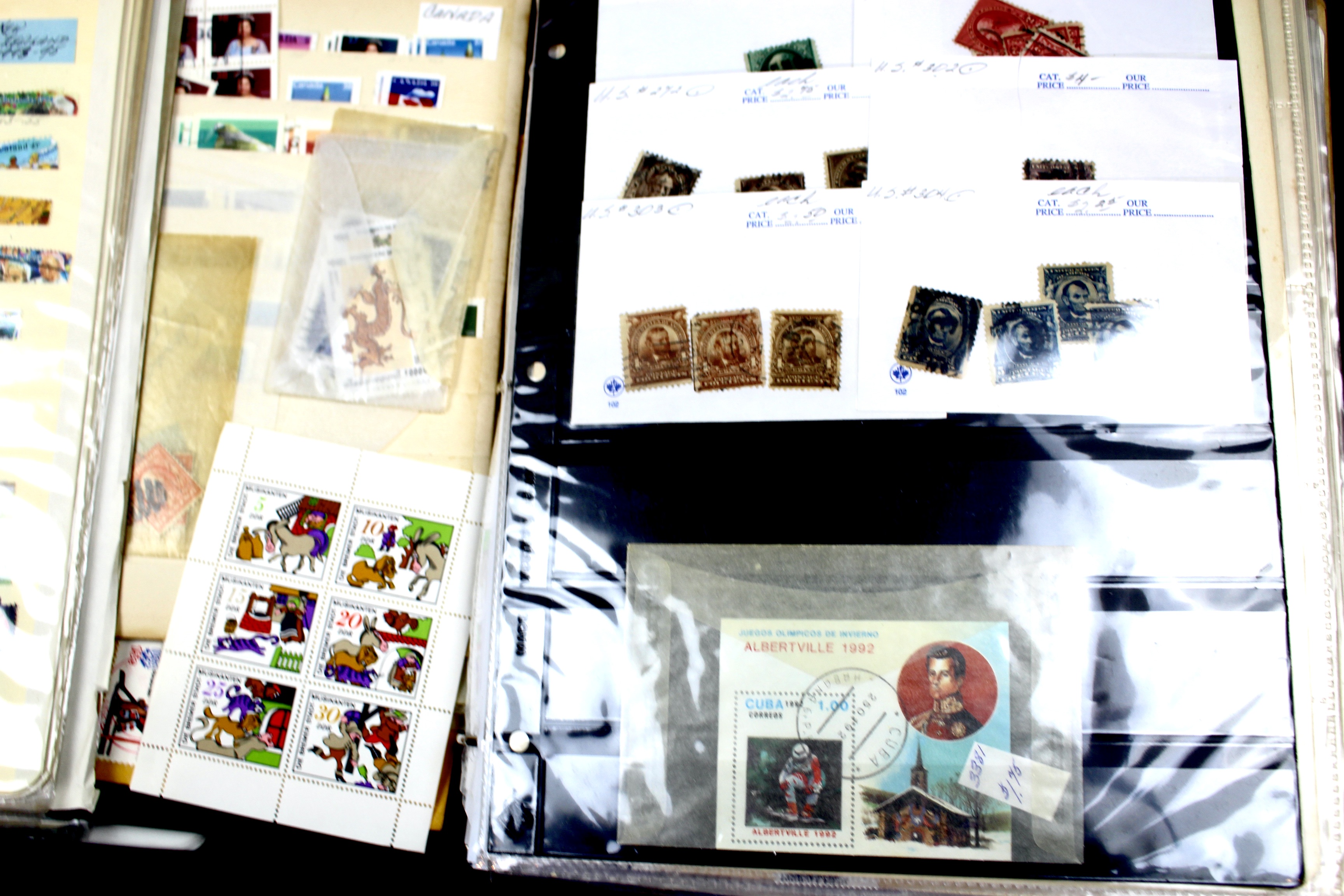 Five Albums of Postage Stamps, Includes World, U.S., Postcards and More