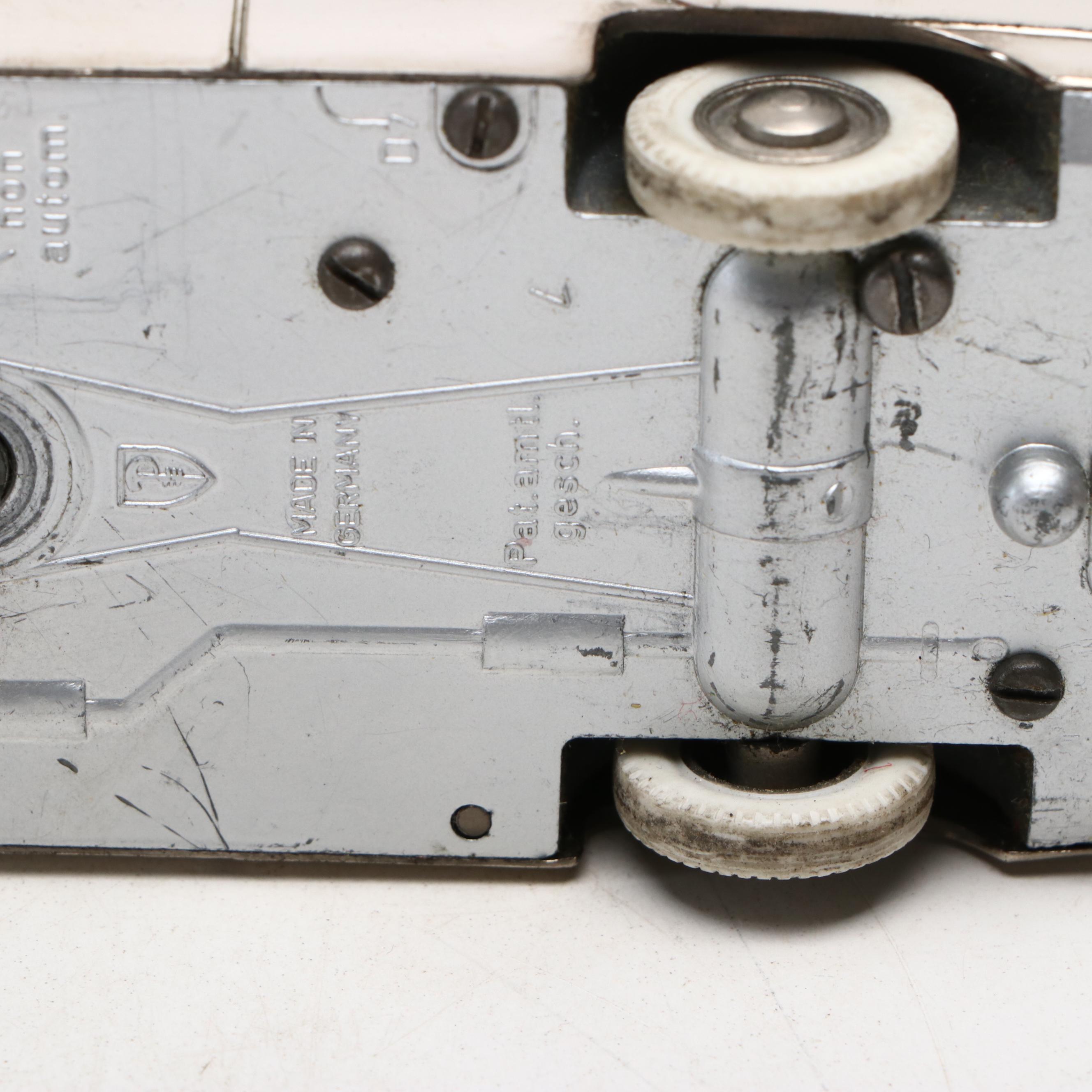 Prameta Opel Kapitan 555 Toy Car and Re-Cord-O Coin Safe, Mid-20th Century