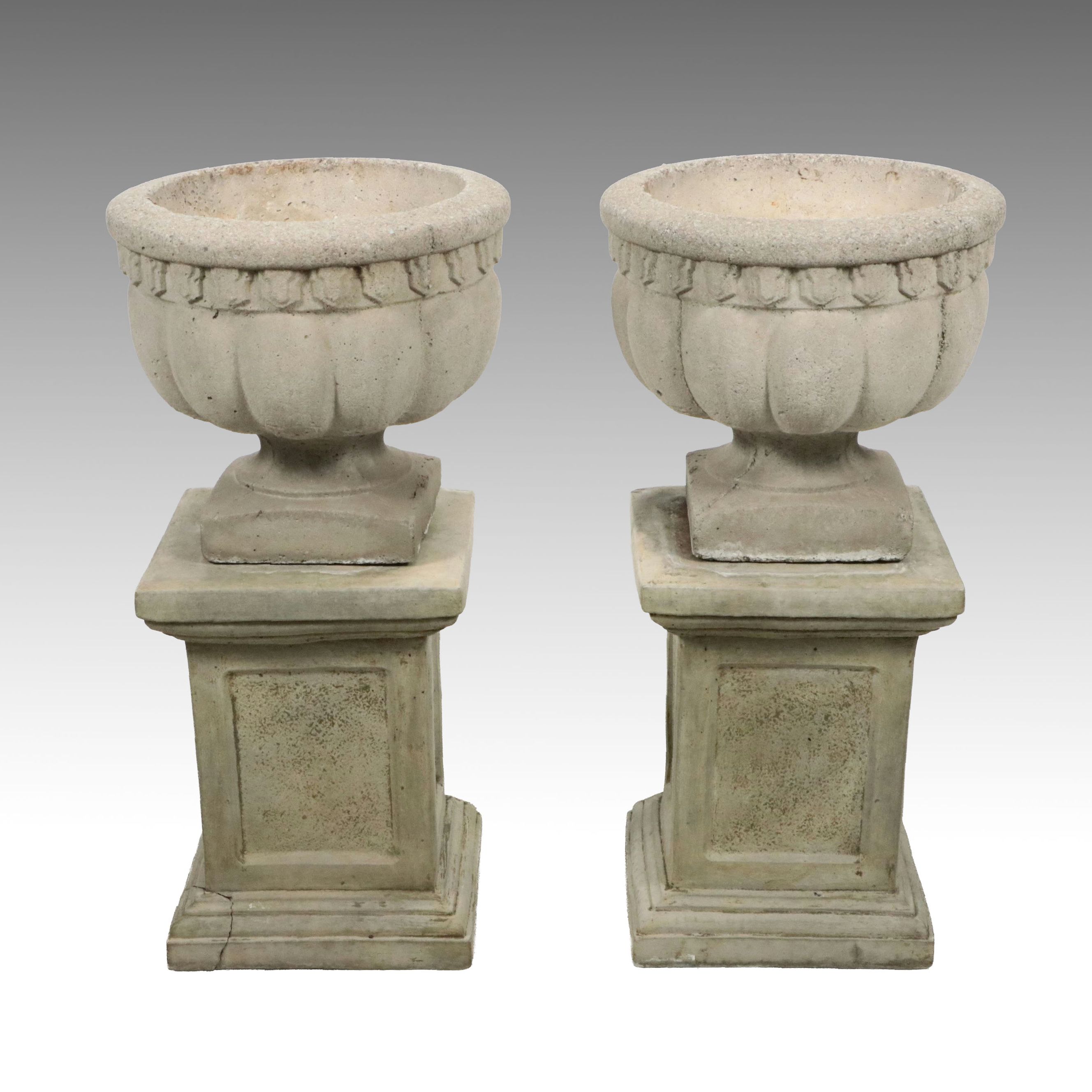 Pair of Neoclassical Style Concrete Planters on Squared Plinths