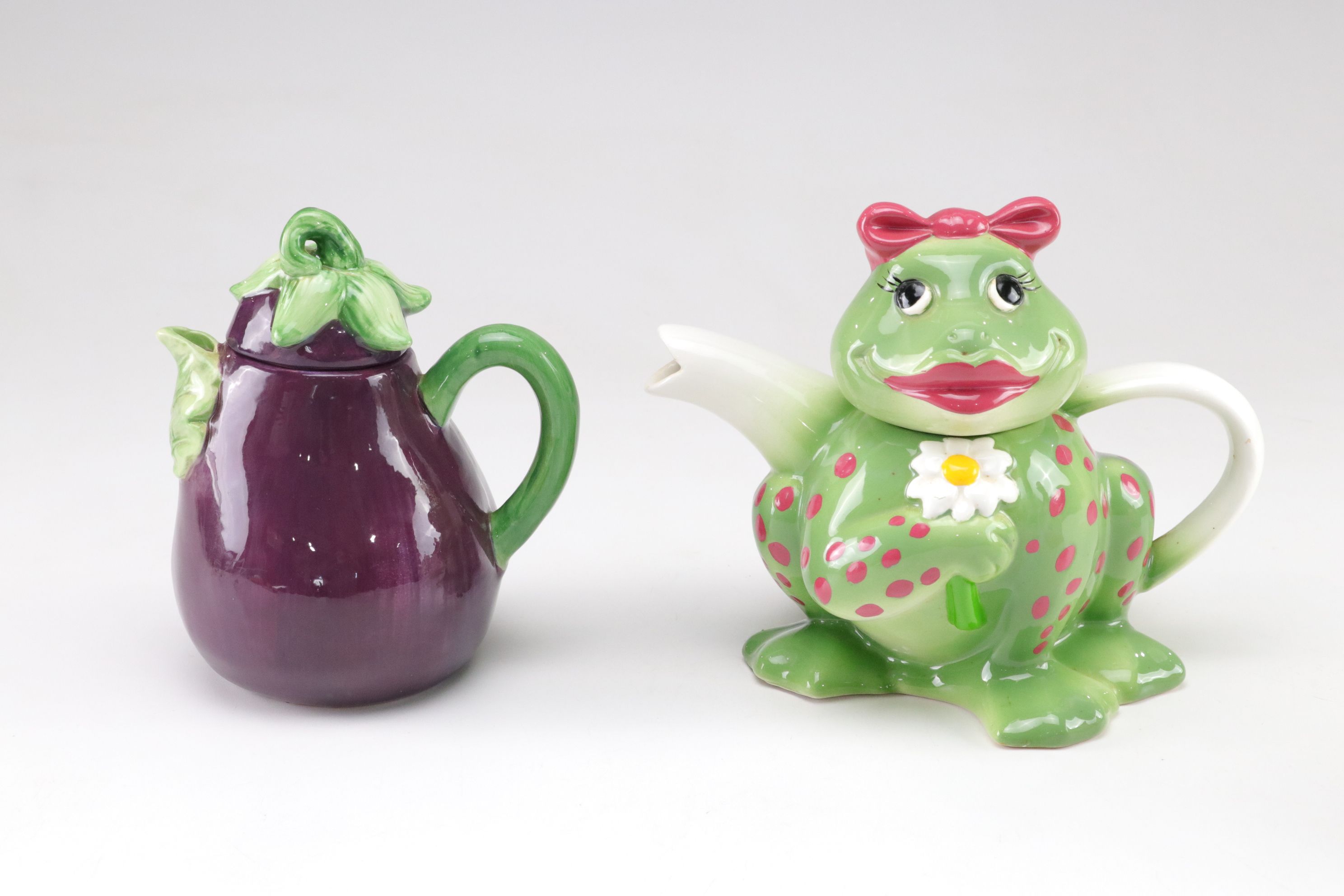 Eggplant, Mrs. Frog and Rooster Figural Teapots with Victoria's Secret Teapot