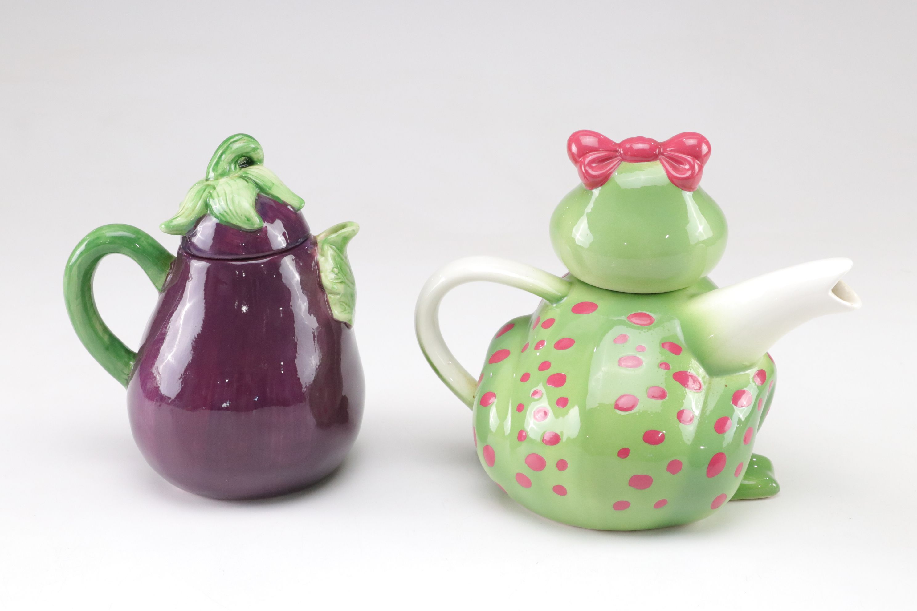 Eggplant, Mrs. Frog and Rooster Figural Teapots with Victoria's Secret Teapot