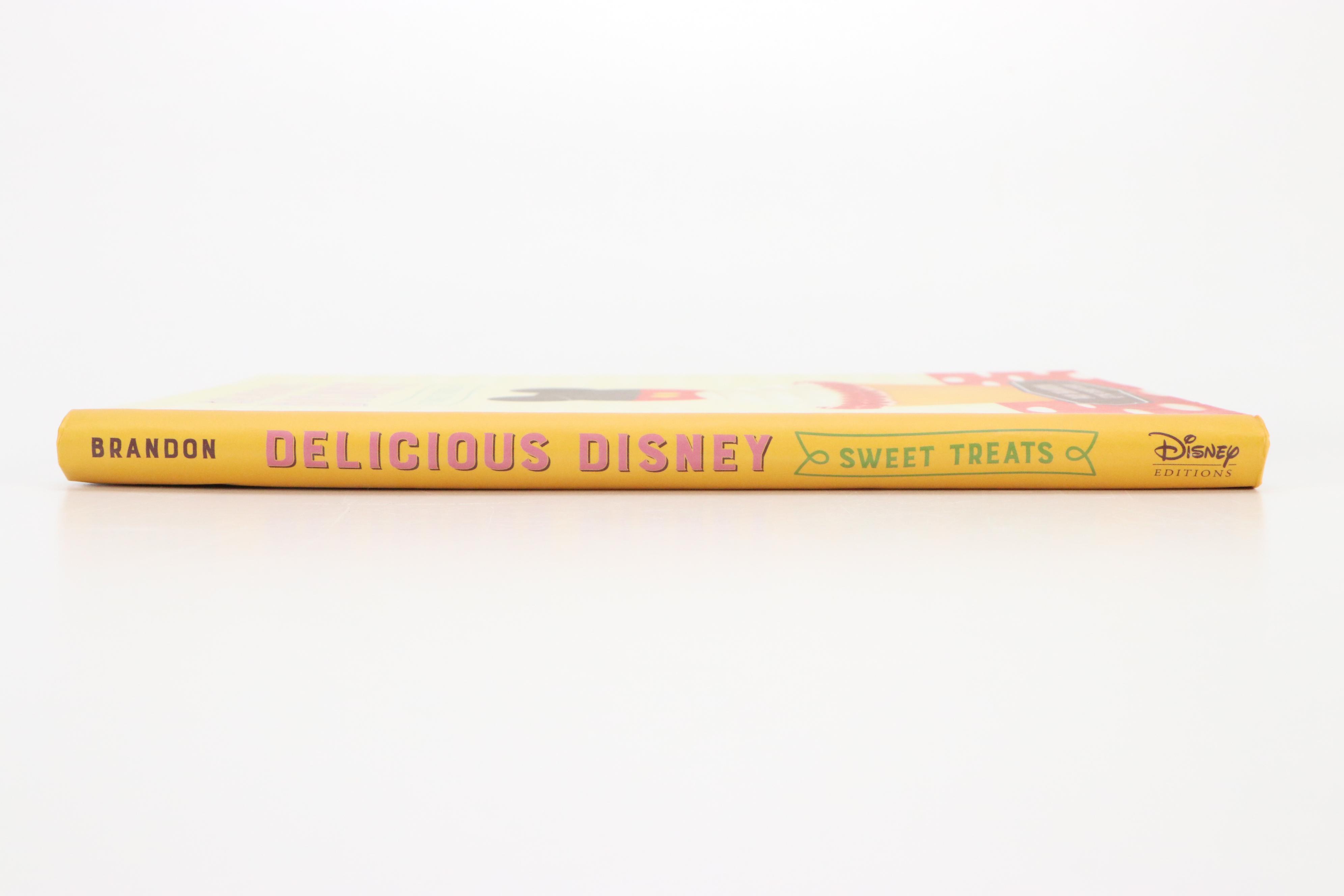 "Delicious Disney Sweet Treats" with Mickey Mouse Football Player Bobblehead