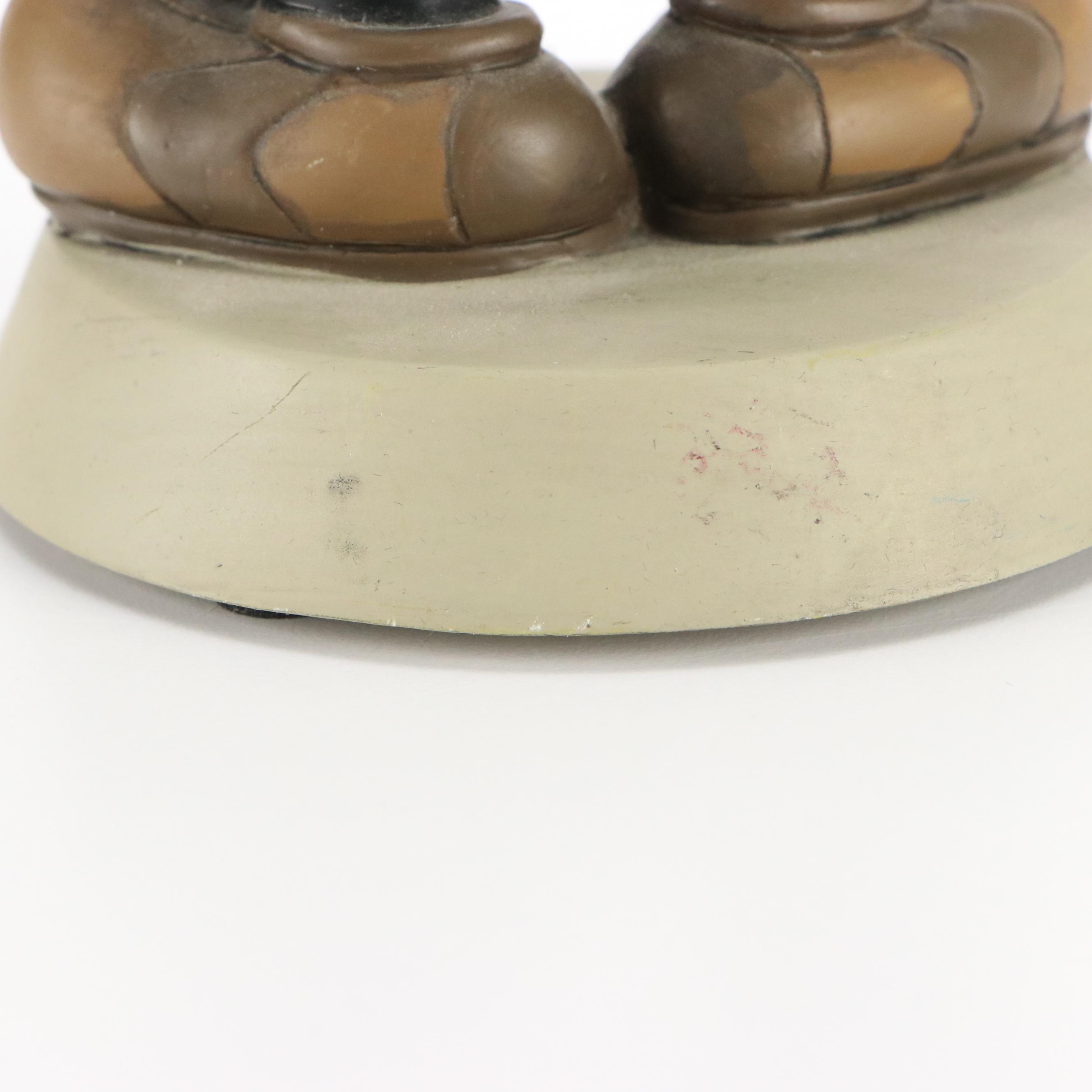 "Delicious Disney Sweet Treats" with Mickey Mouse Football Player Bobblehead