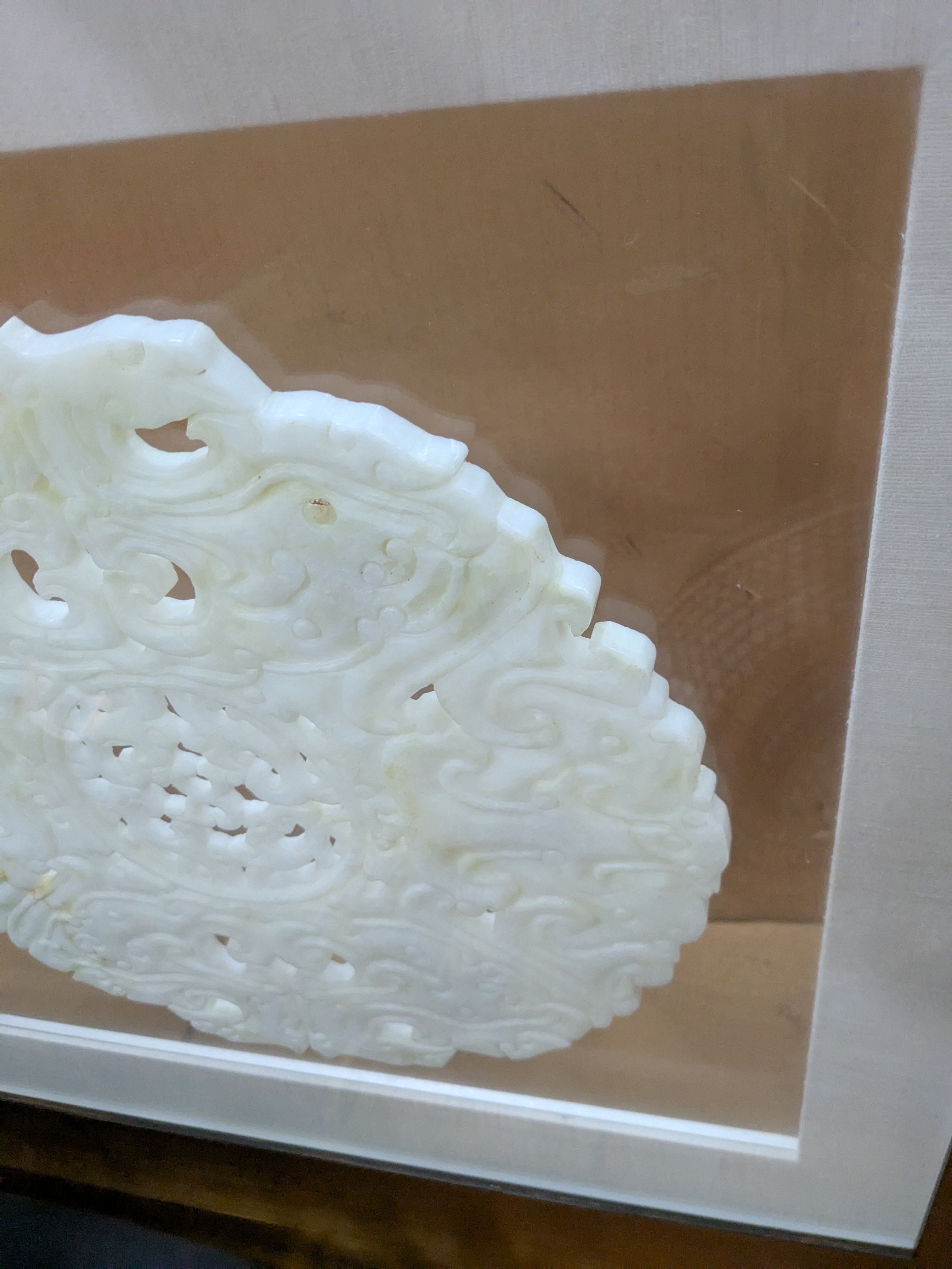 Chinese Hand-Carved Serpentine Disc in Floating Frame