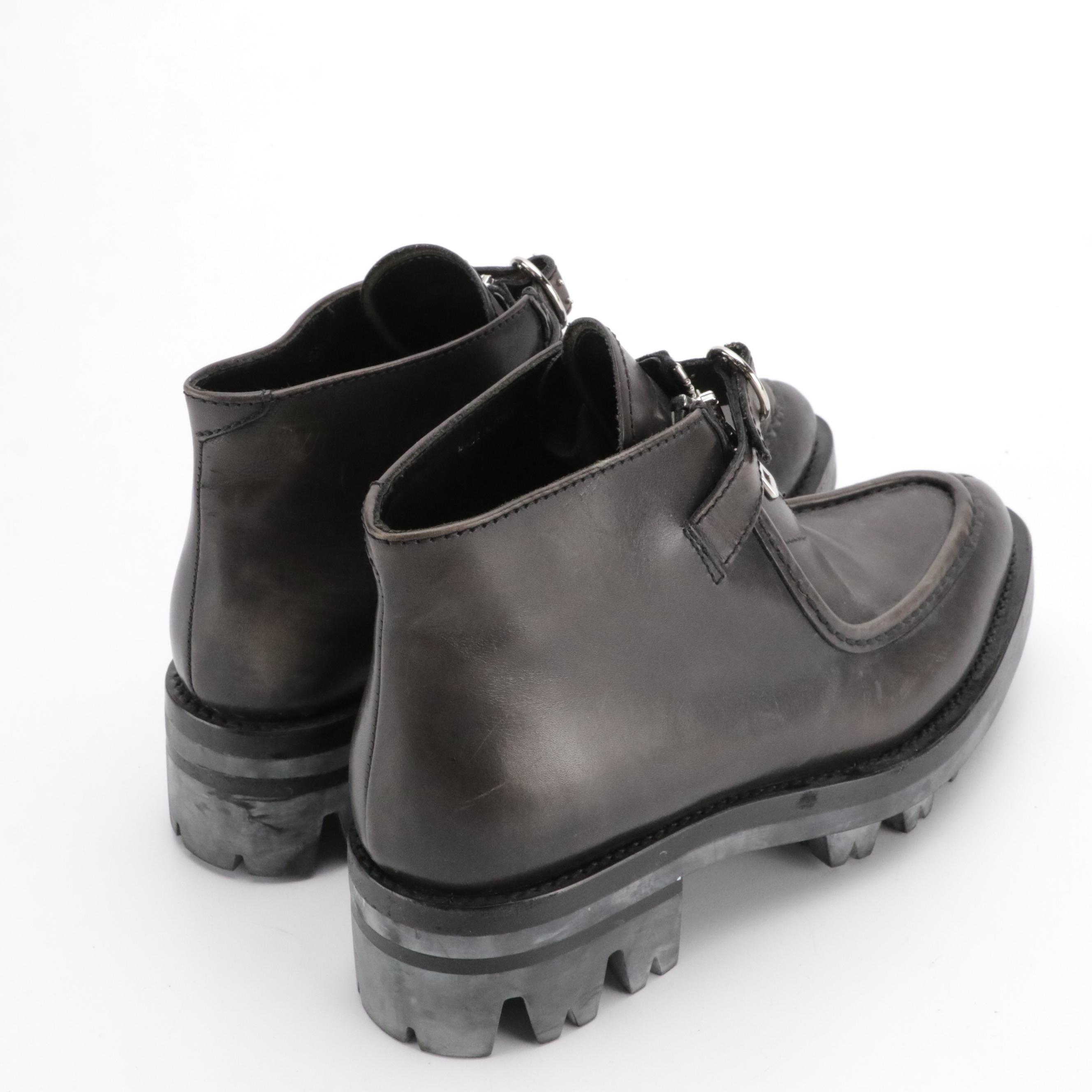 Prada Zipper-Front Buckle Strap Ankle Boots in Black Leather