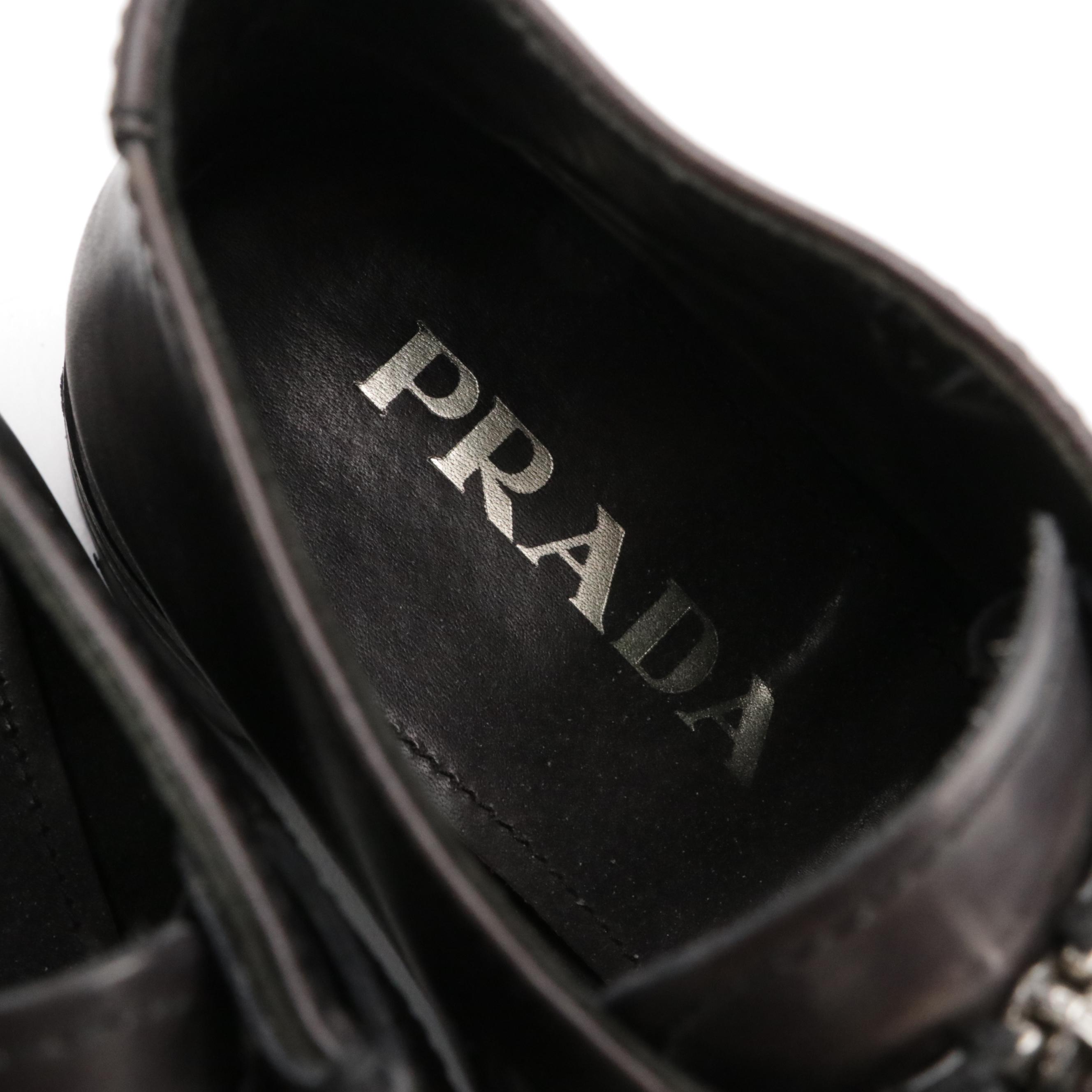 Prada Zipper-Front Buckle Strap Ankle Boots in Black Leather