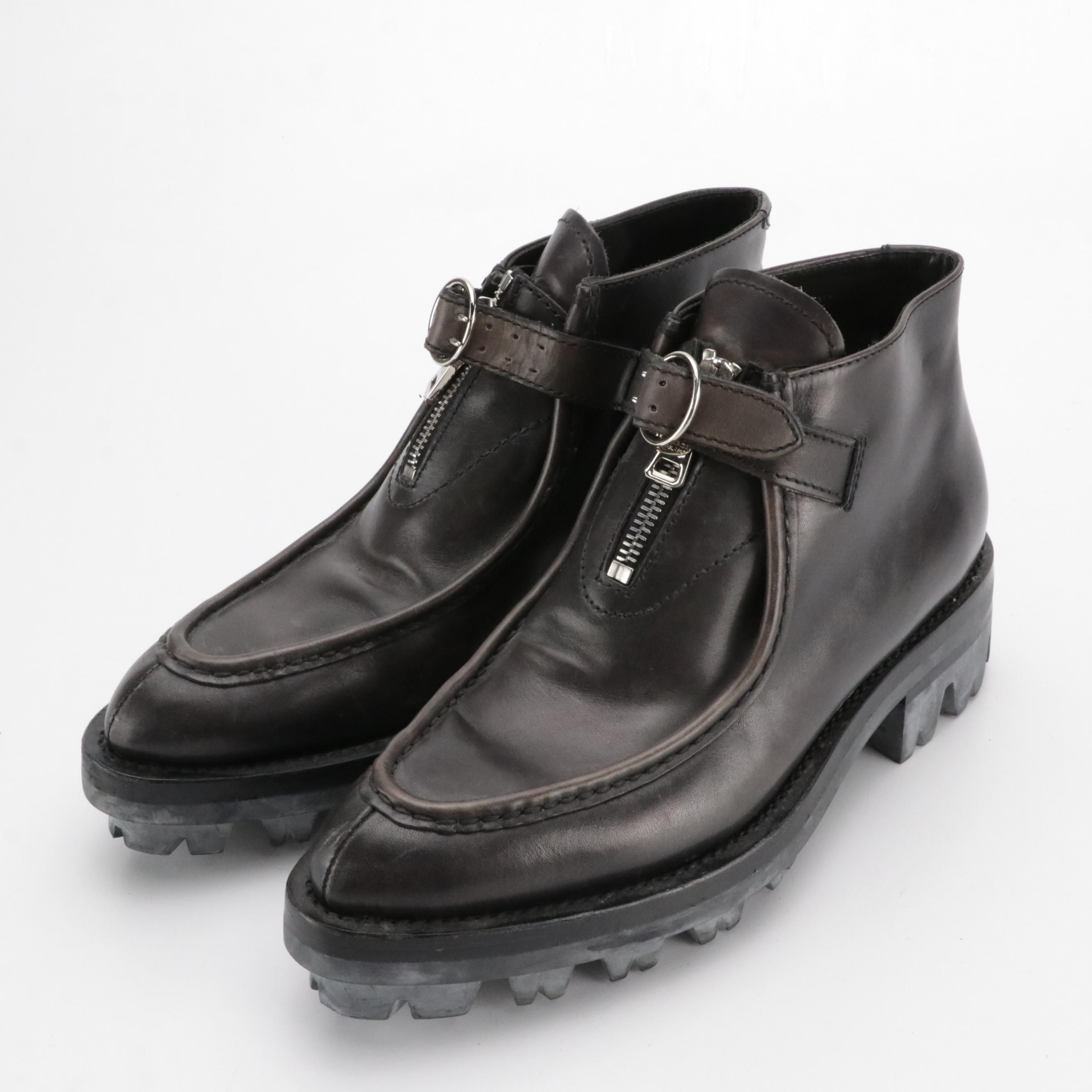 Prada Zipper-Front Buckle Strap Ankle Boots in Black Leather