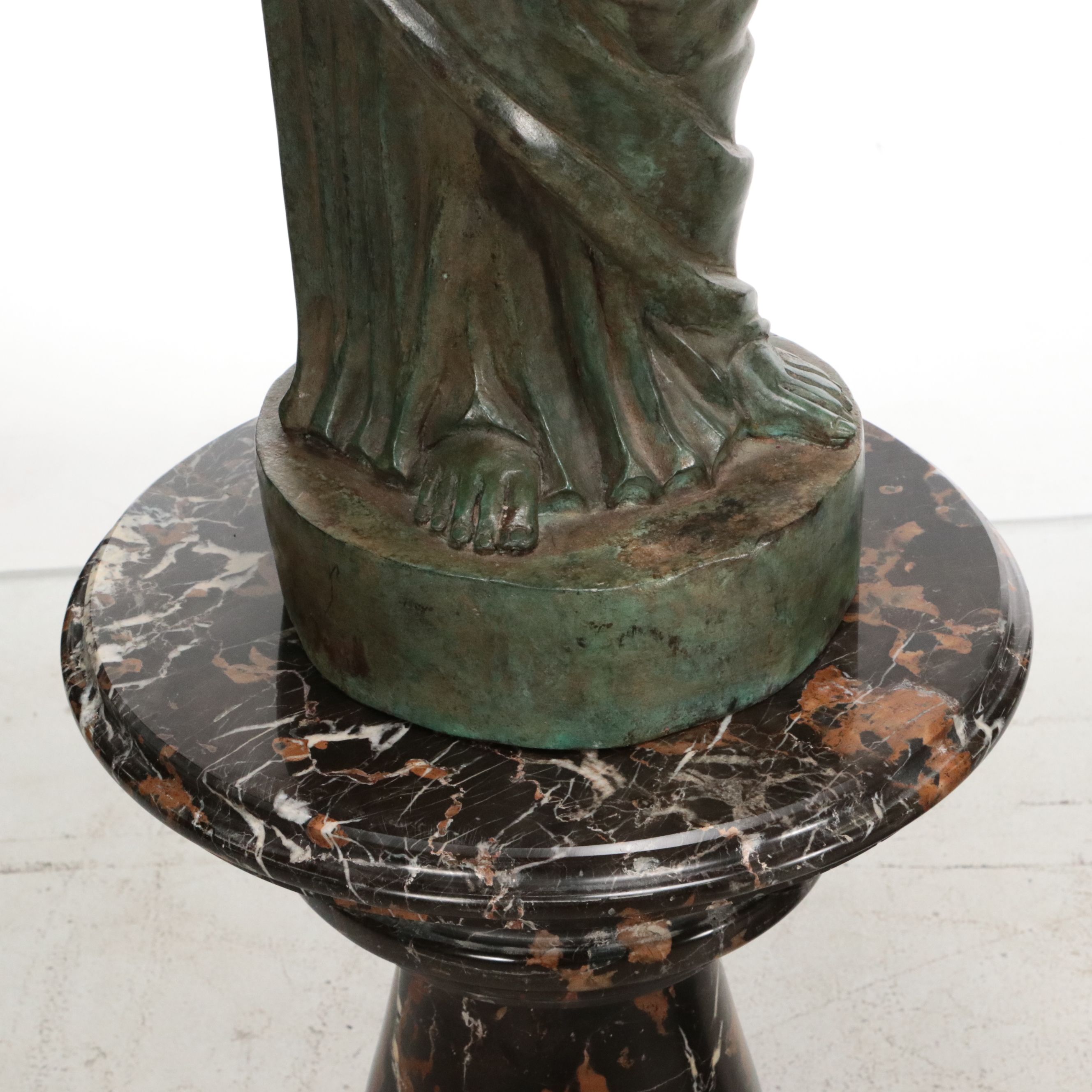 Pair of Neoclassical Style Patinated Finish Cast Metal Angels on Marble Plinths