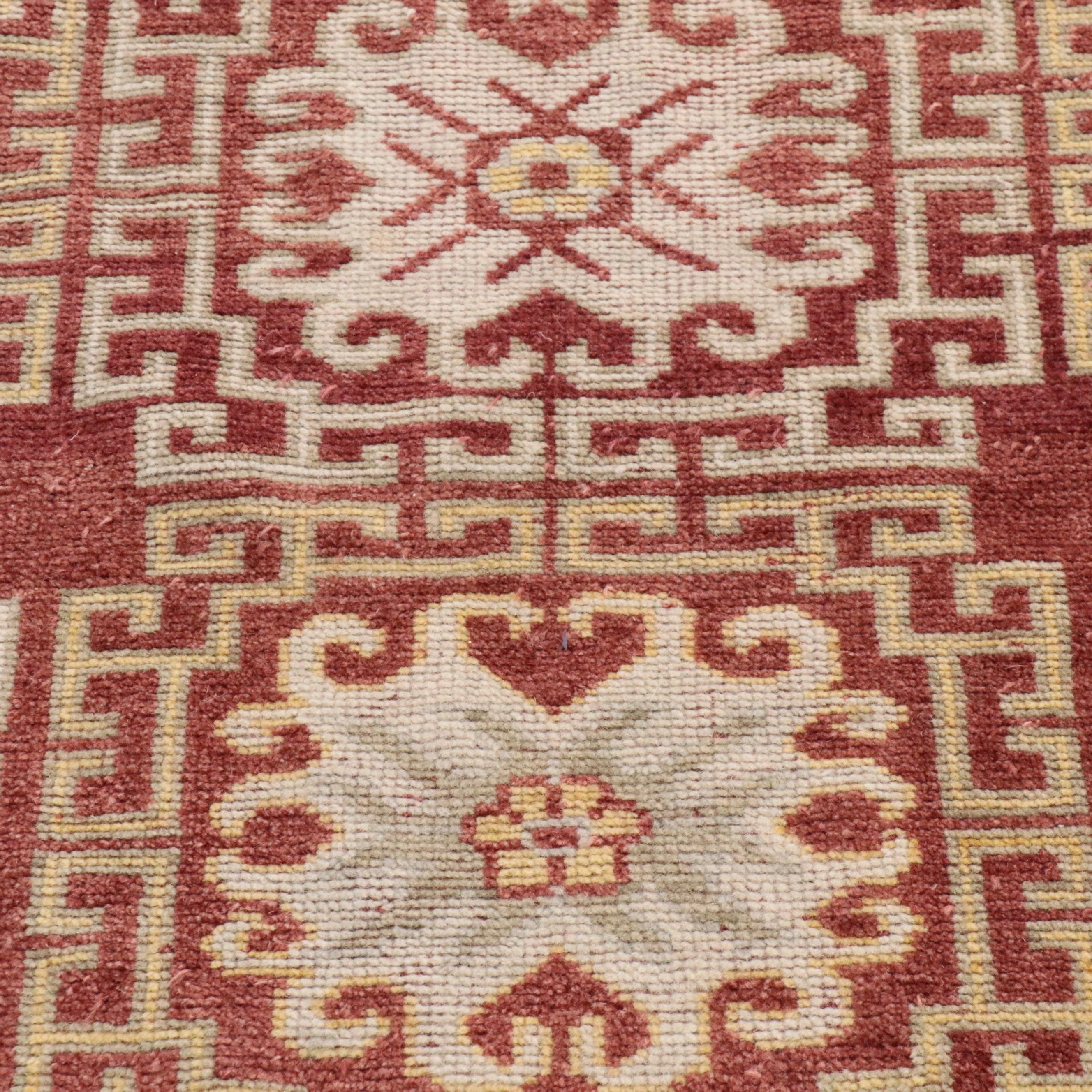 6' x 8'11 Hand-Knotted Tibetan Floral and Geometric Area Rug