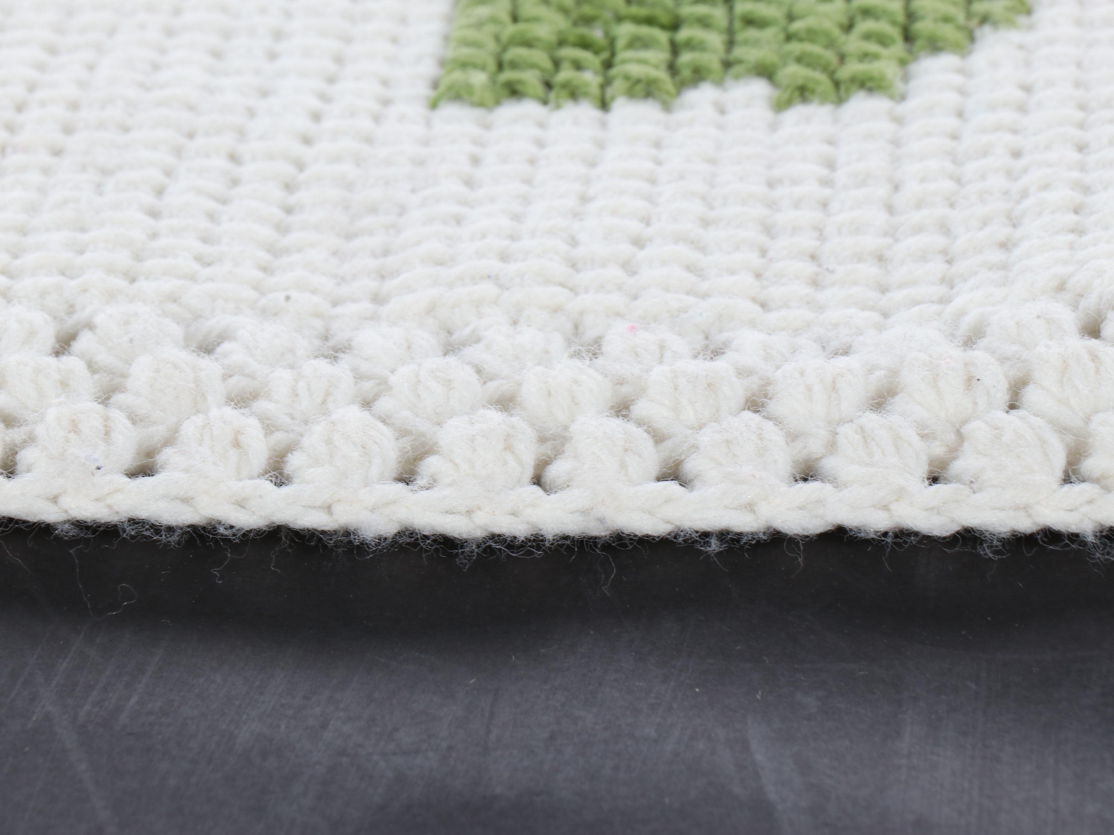 Handmade Floral Cross-Stitch on Crochet Blanket