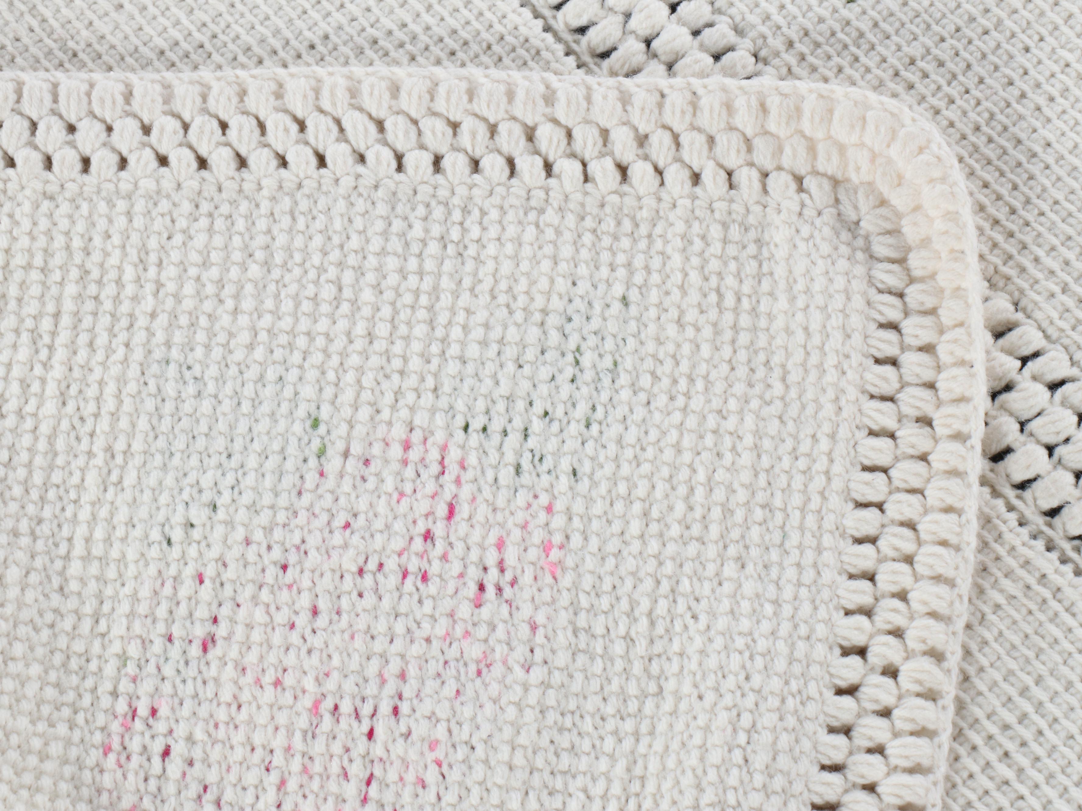 Handmade Floral Cross-Stitch on Crochet Blanket