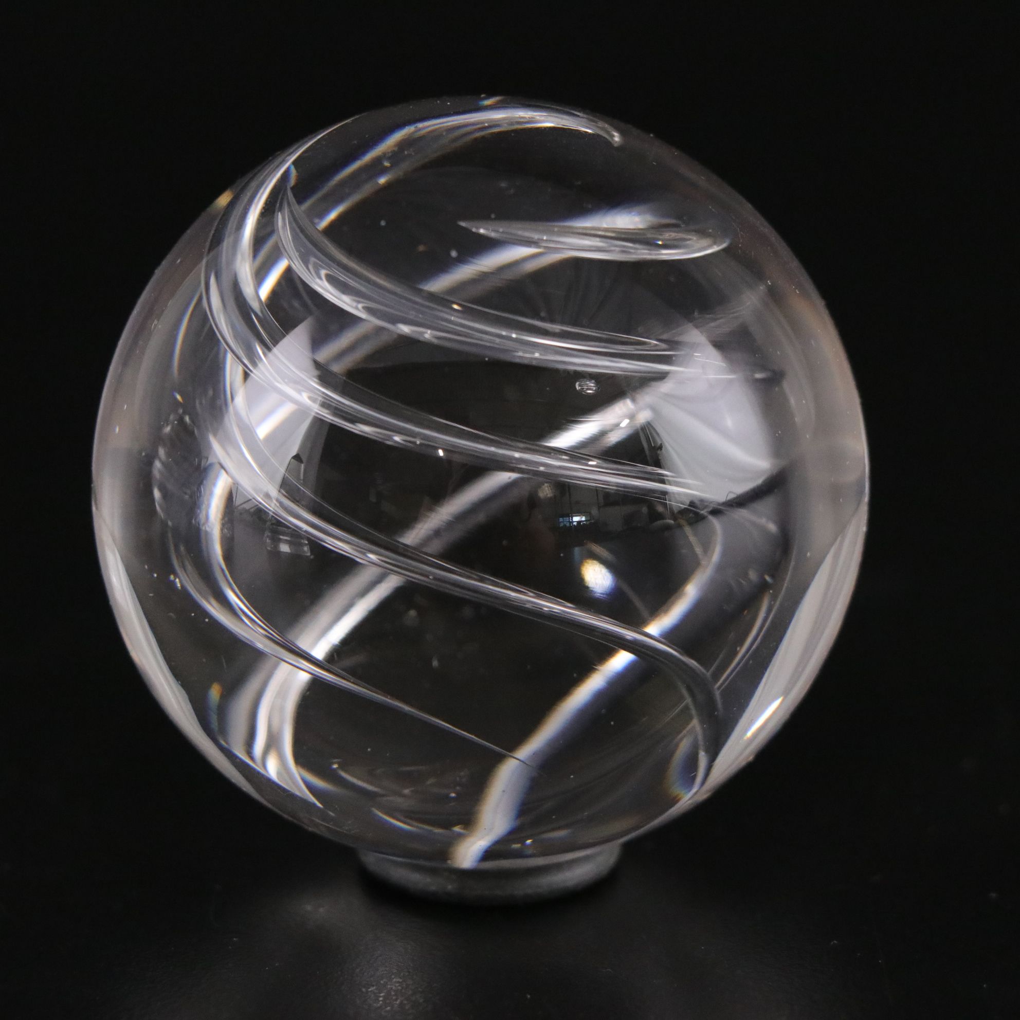 Crystal Ball and Four Crystal Paperweights