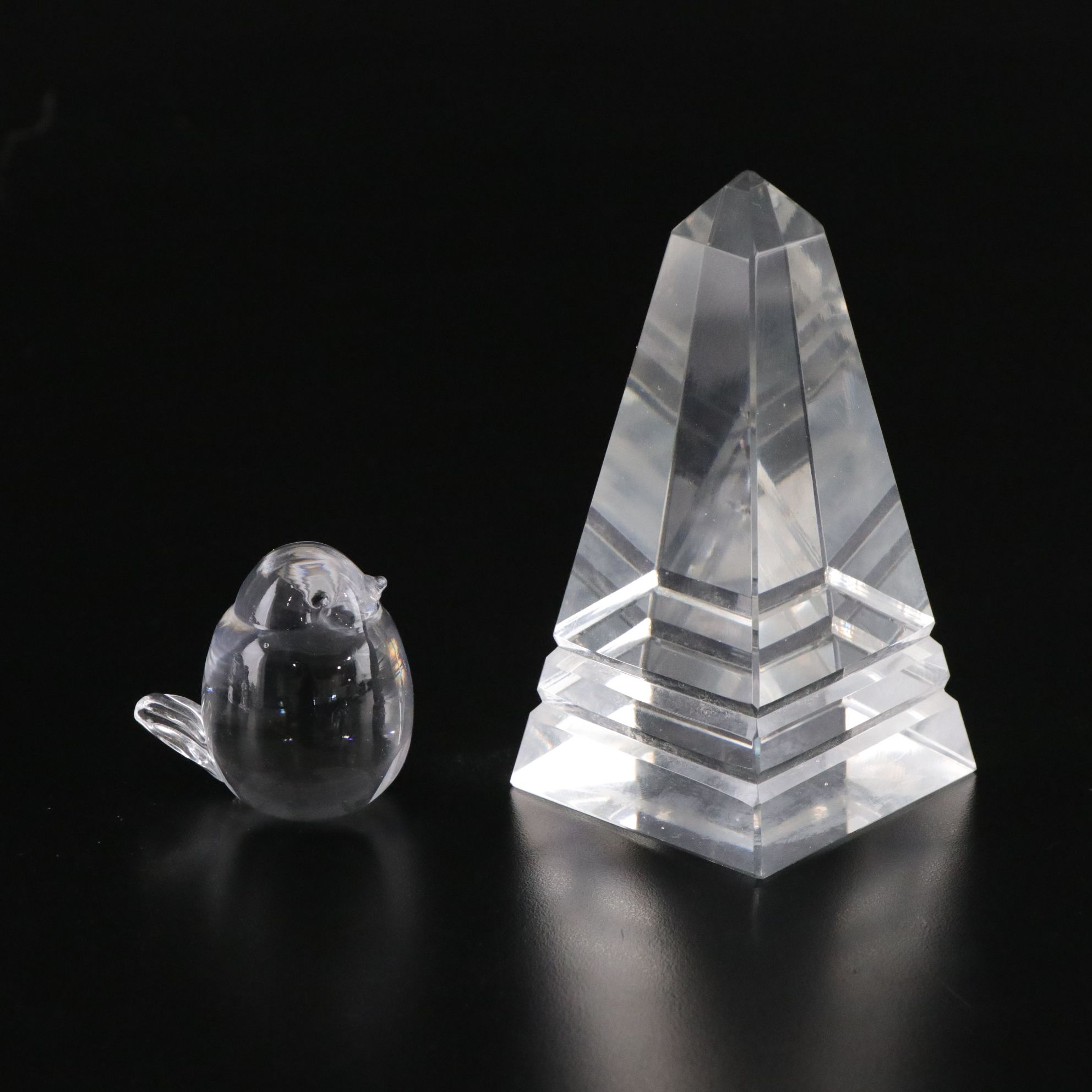 Crystal Ball and Four Crystal Paperweights