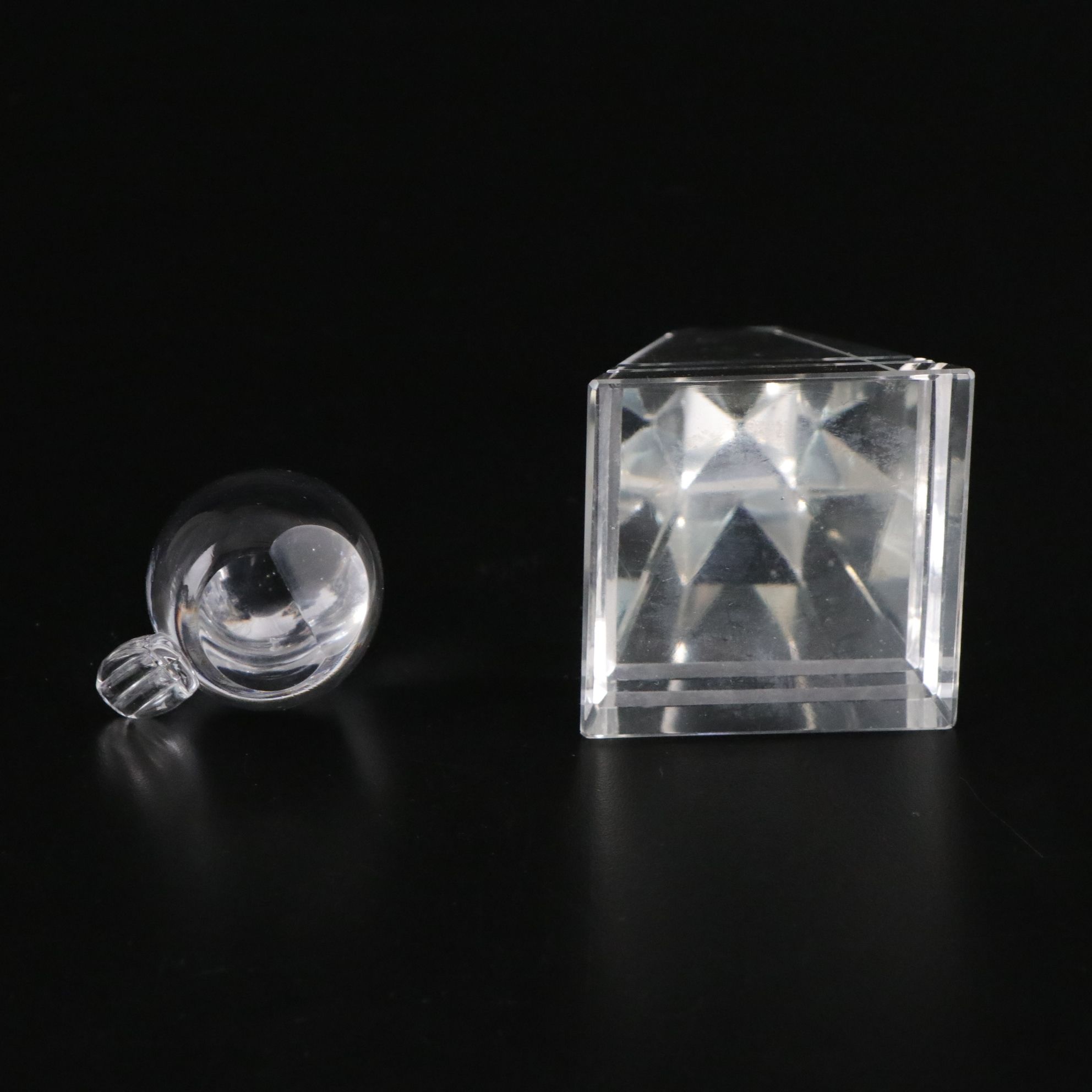 Crystal Ball and Four Crystal Paperweights