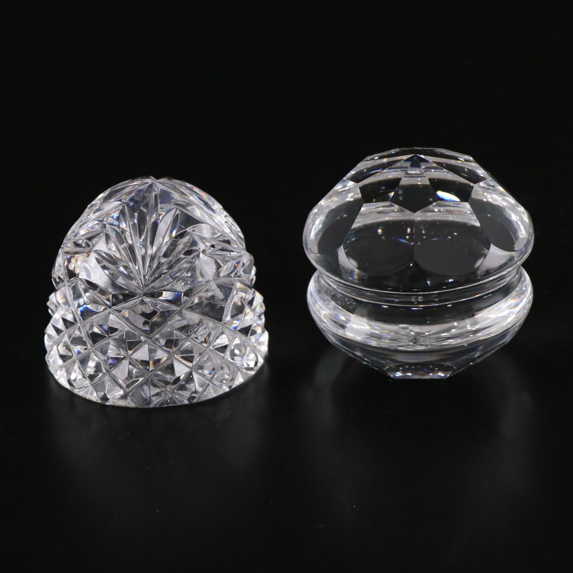 Crystal Ball and Four Crystal Paperweights