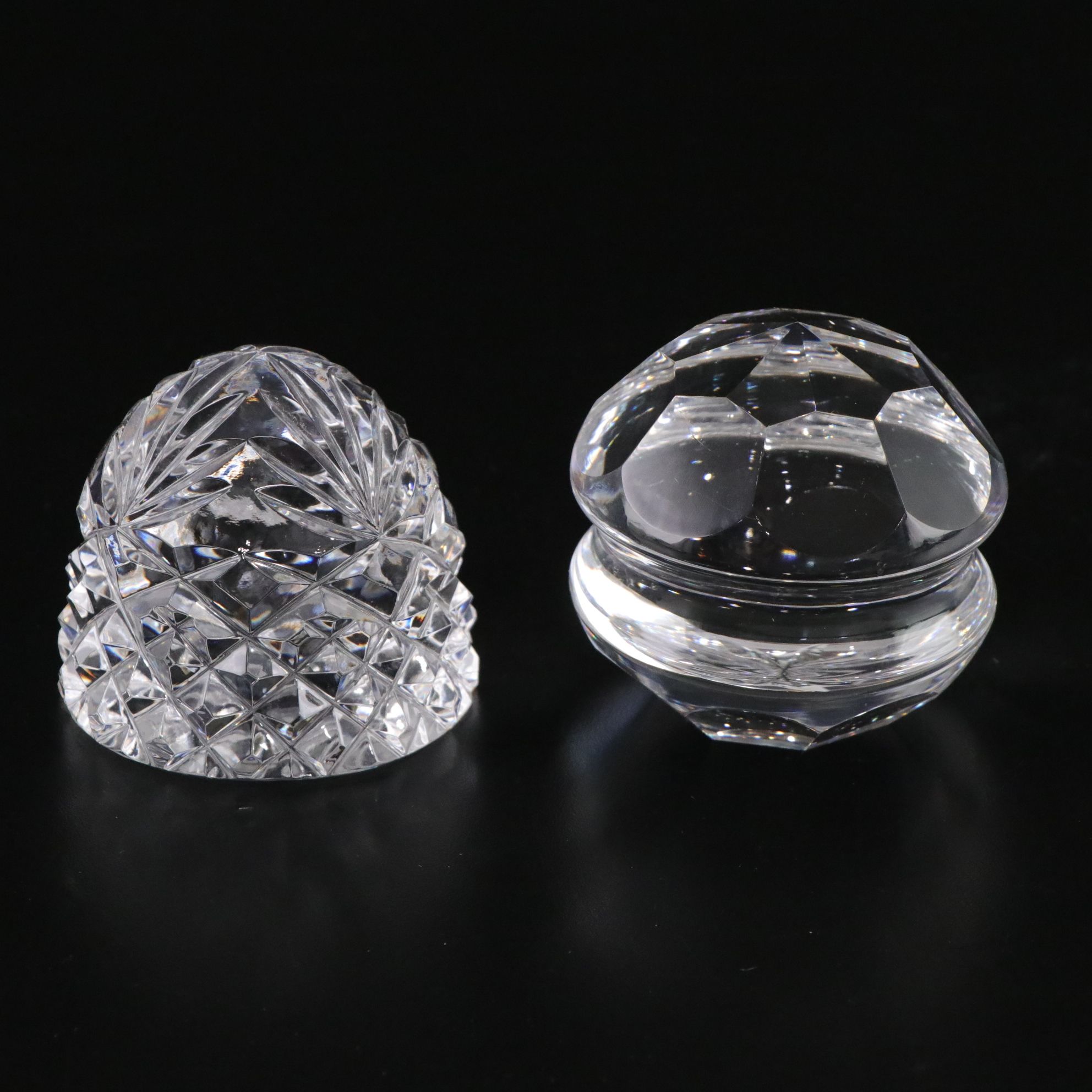 Crystal Ball and Four Crystal Paperweights