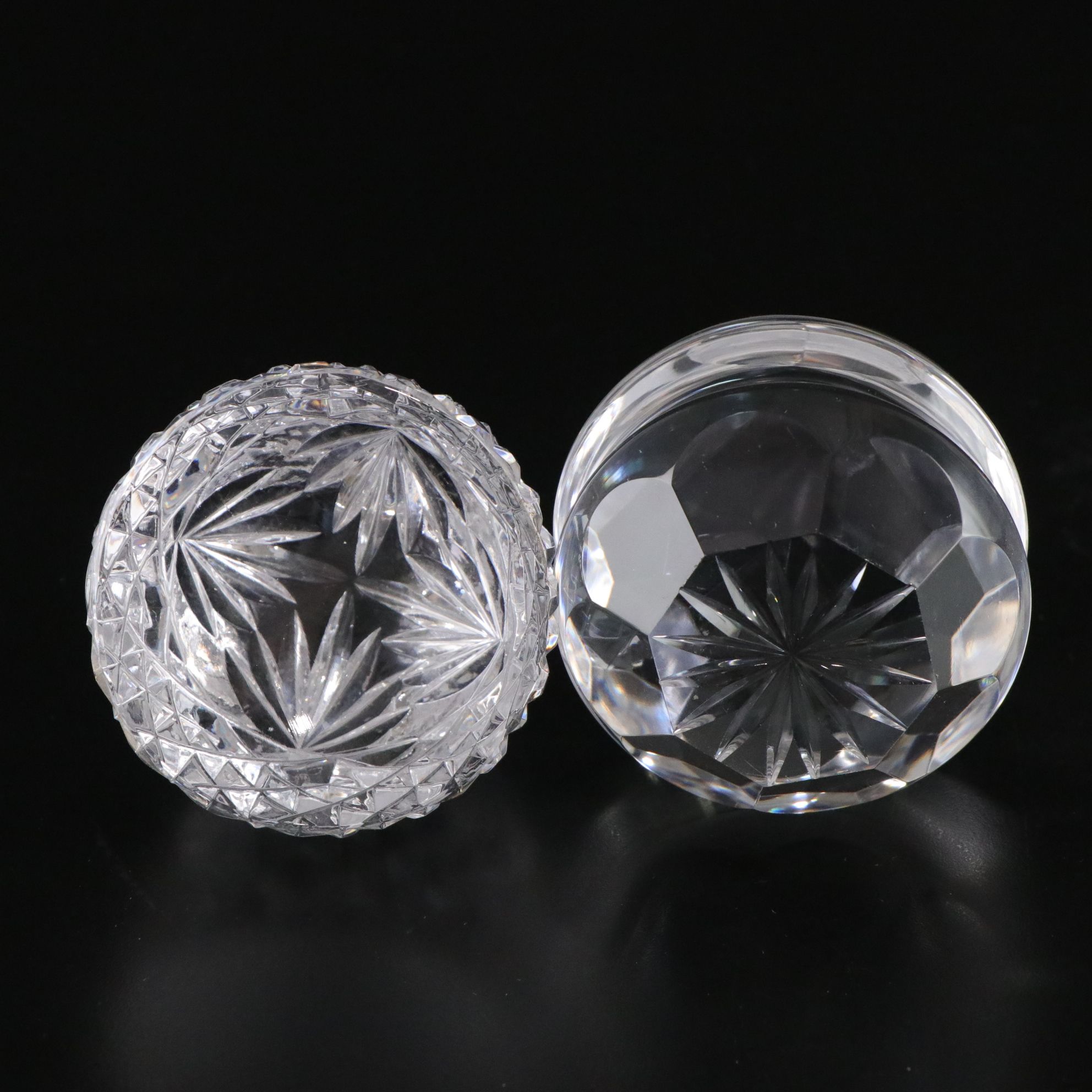 Crystal Ball and Four Crystal Paperweights