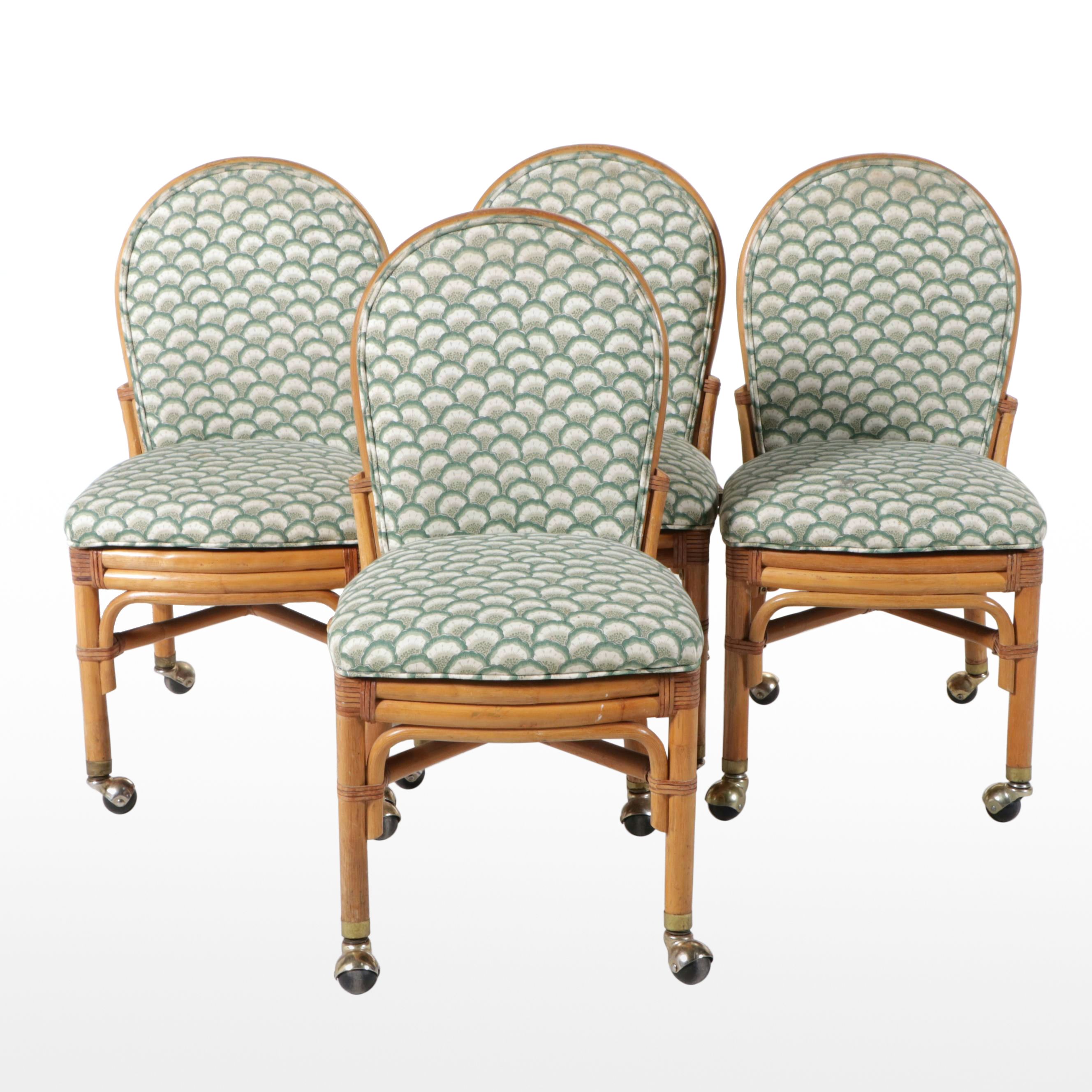 Set of Four Rattan Dining Chairs on Wheels