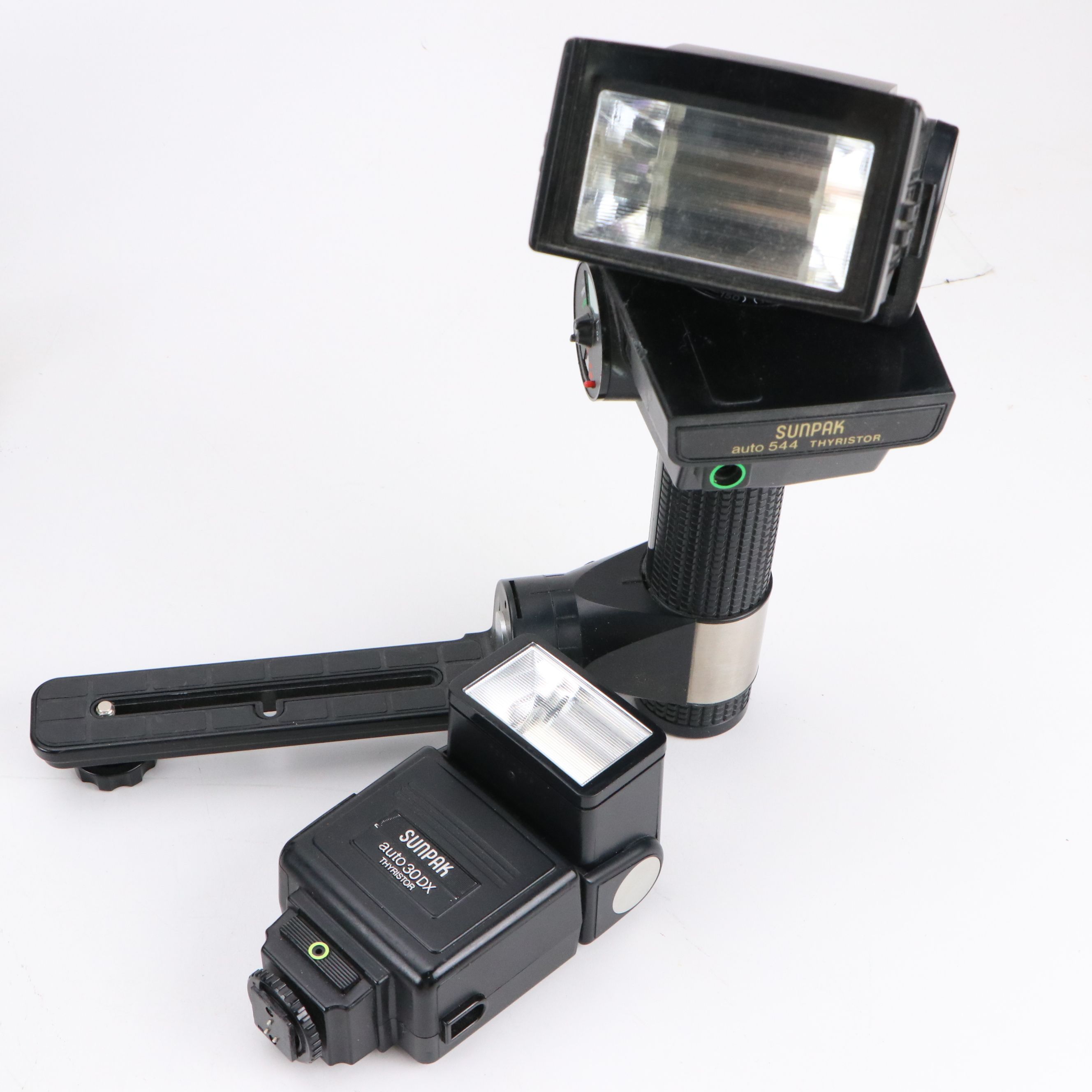 Canon EP and Argus Still Cameras with Sunpak Thyristor and More Accessories