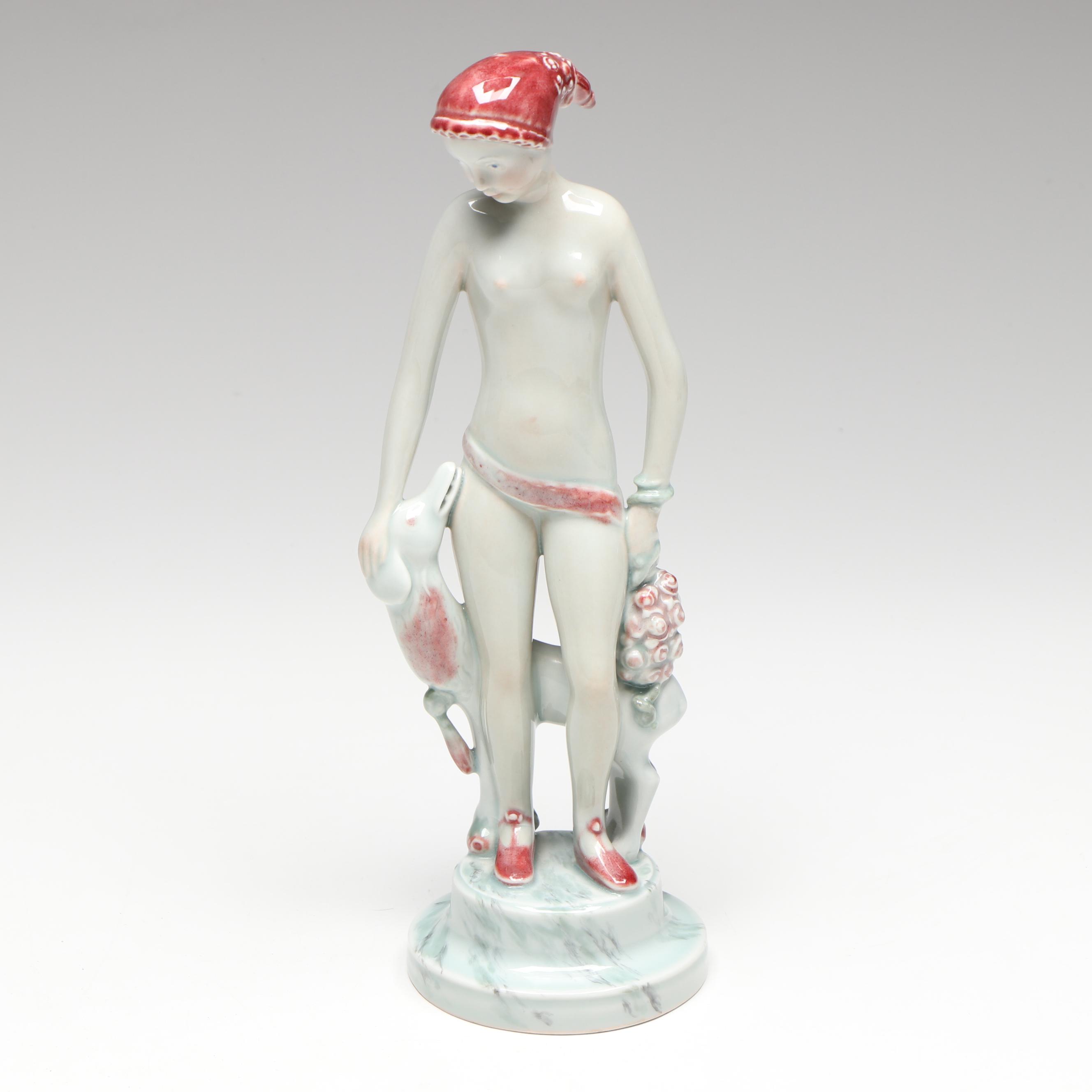 Georg Thylstrup for Royal Copenhagen Porcelain Woman and Dog Figurine